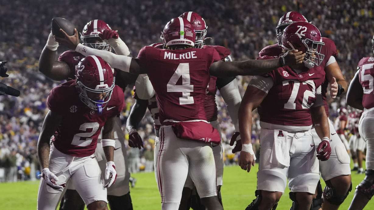 Alabama quarterback Jalen Milroe (4) celebrates a touchdown carry in the second half an NCAA college football game against LSU in Baton Rouge, La., Saturday, Nov. 9, 2024.
