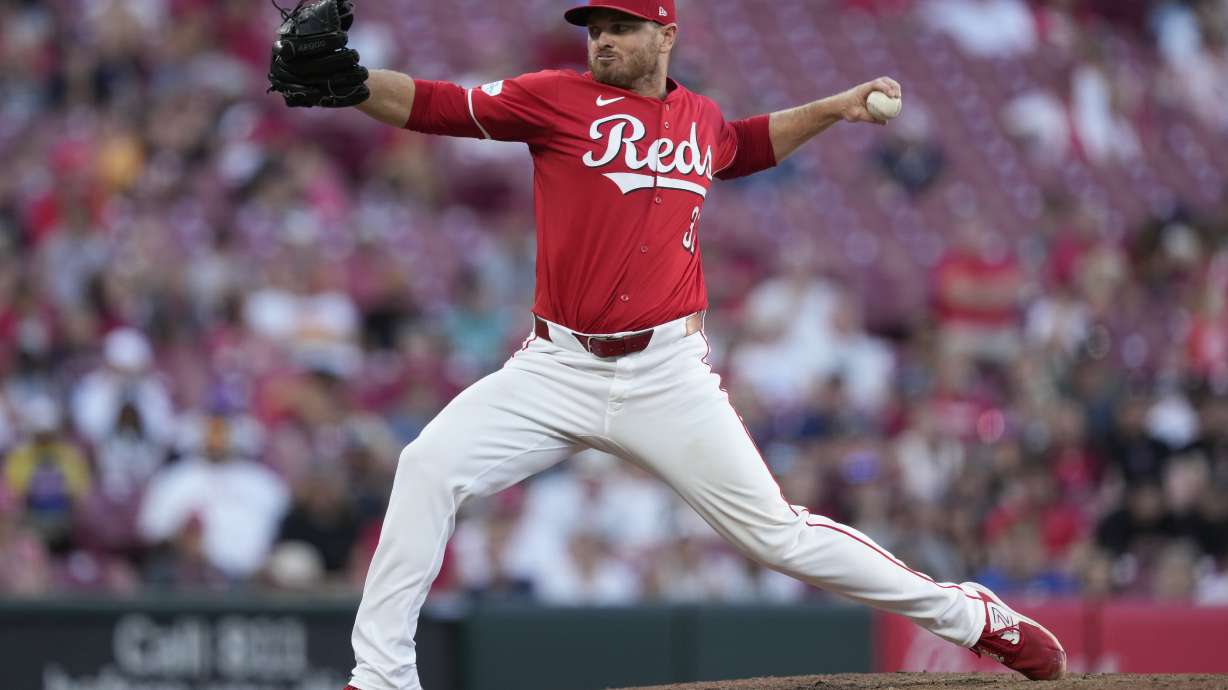 FILE - Cincinnati Reds pitcher Justin Wilson throws during the ninth inning of a baseball game against the Houston Astros, Monday, Sept. 2, 2024, in Cincinnati.