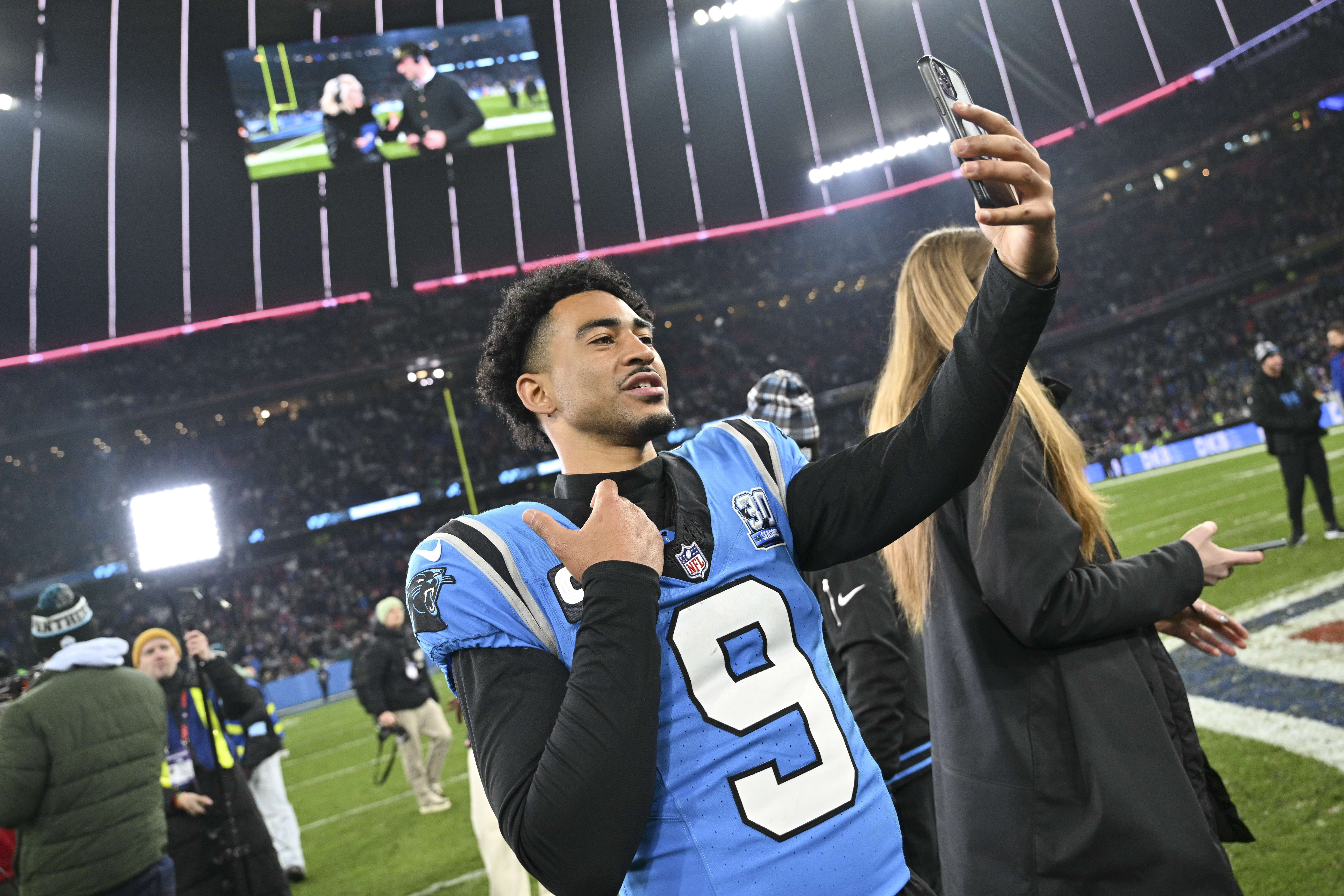 Carolina Panthers quarterback Bryce Young celebrates after their overtime win in an NFL football game against the New York Giants, Sunday, Nov. 10, 2024, in Munich, Germany.