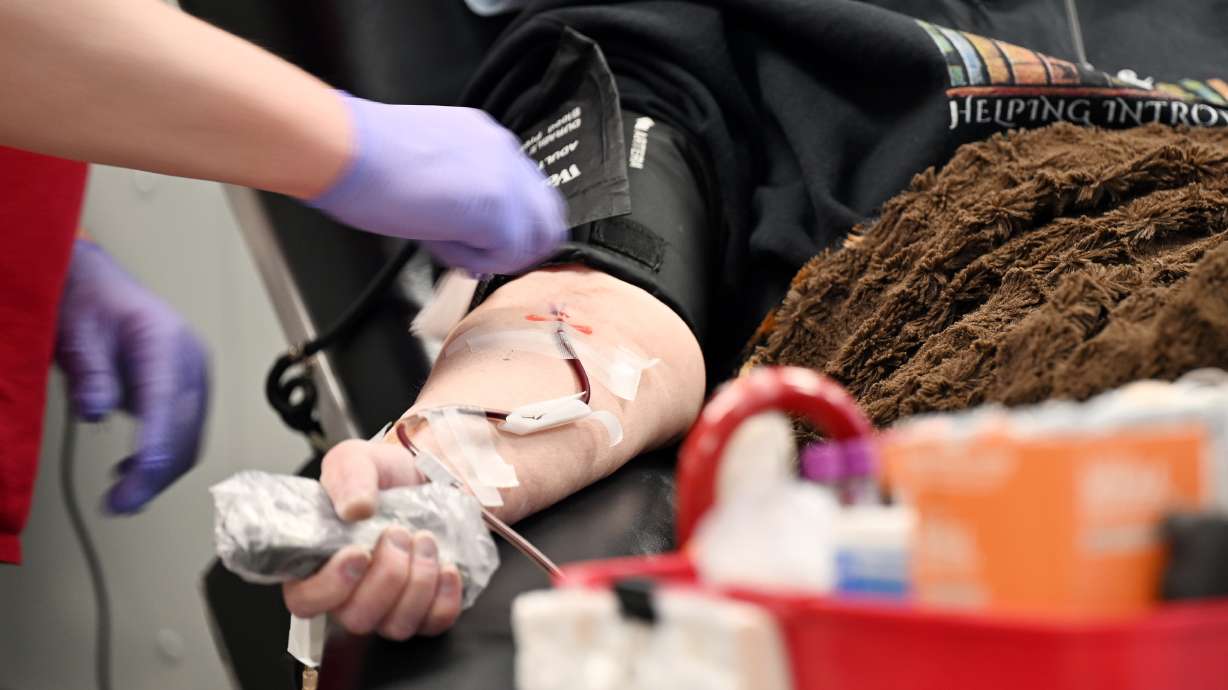 Debbie Millet donates blood at the American Red Cross Murray location on Jan. 8. In November, the local Red Cross called for more blood donations, especially from people with Type O blood.