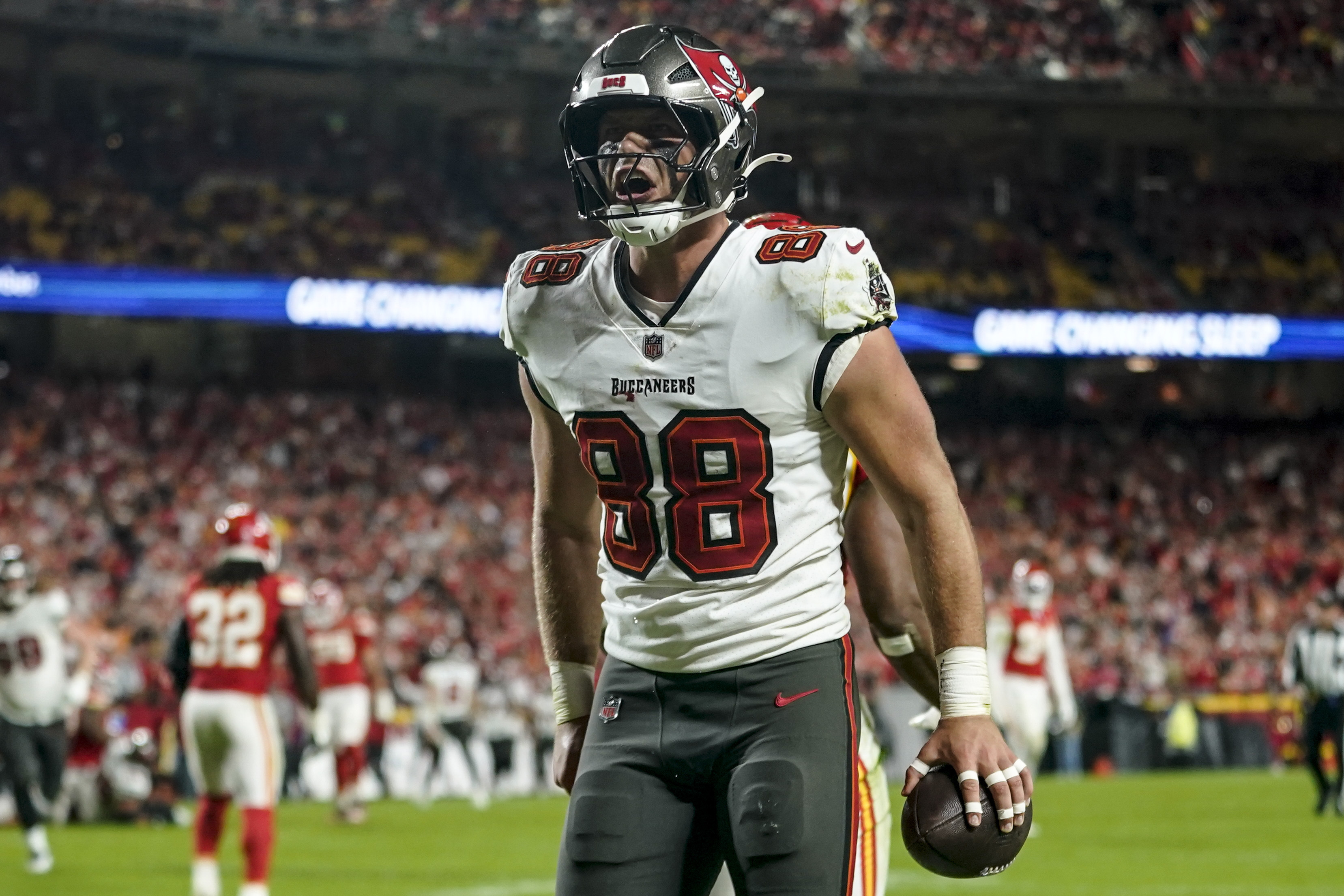 Tampa Bay Buccaneers tight end Cade Otton (88) celebrates his touchdown catch against the Kansas City Chiefs during the second half of an NFL football game, Monday, Nov. 4, 2024, in Kansas City, Mo.