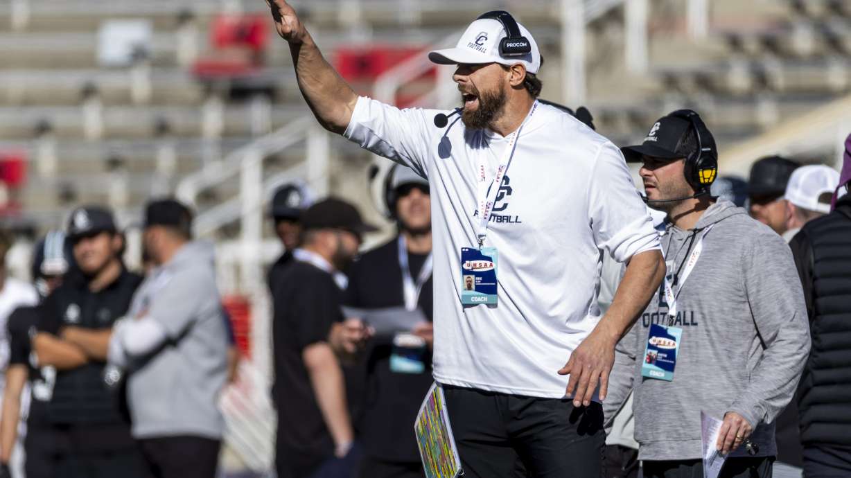 Corner Canyon head coach Eric Kjar talks after a play during a 6A high school football semifinal game against Lehi held at Rice-Eccles Stadium in Salt Lake City on Thursday, Nov. 14, 2024.