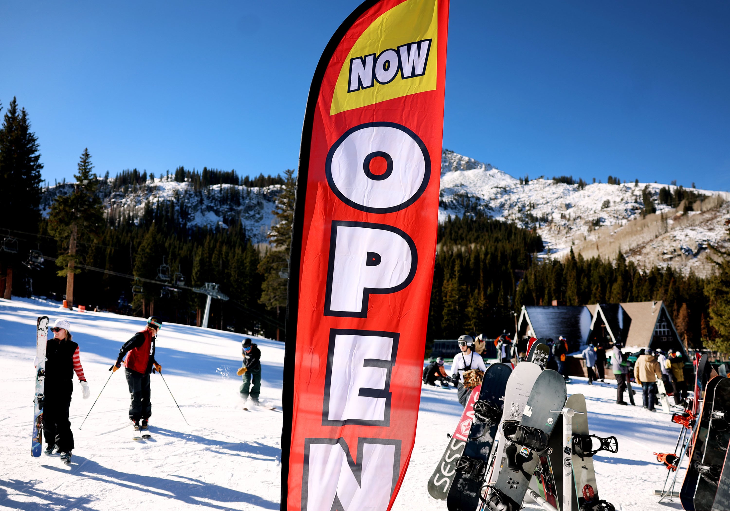 People ski and snowboard at the grand opening of the season at Brighton Resort in Big Cottonwood Canyon on Thursday.