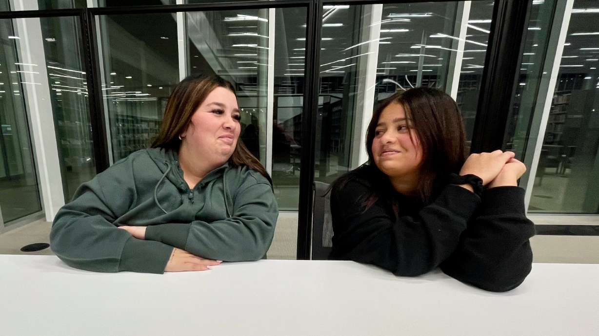 Jabri Fox, right, with her mom, Casey Thompson, at the Weber County Library System branch in Roy on Wednesday. Jabri, now 12, was talking about the heart transplant operation she underwent two years ago.