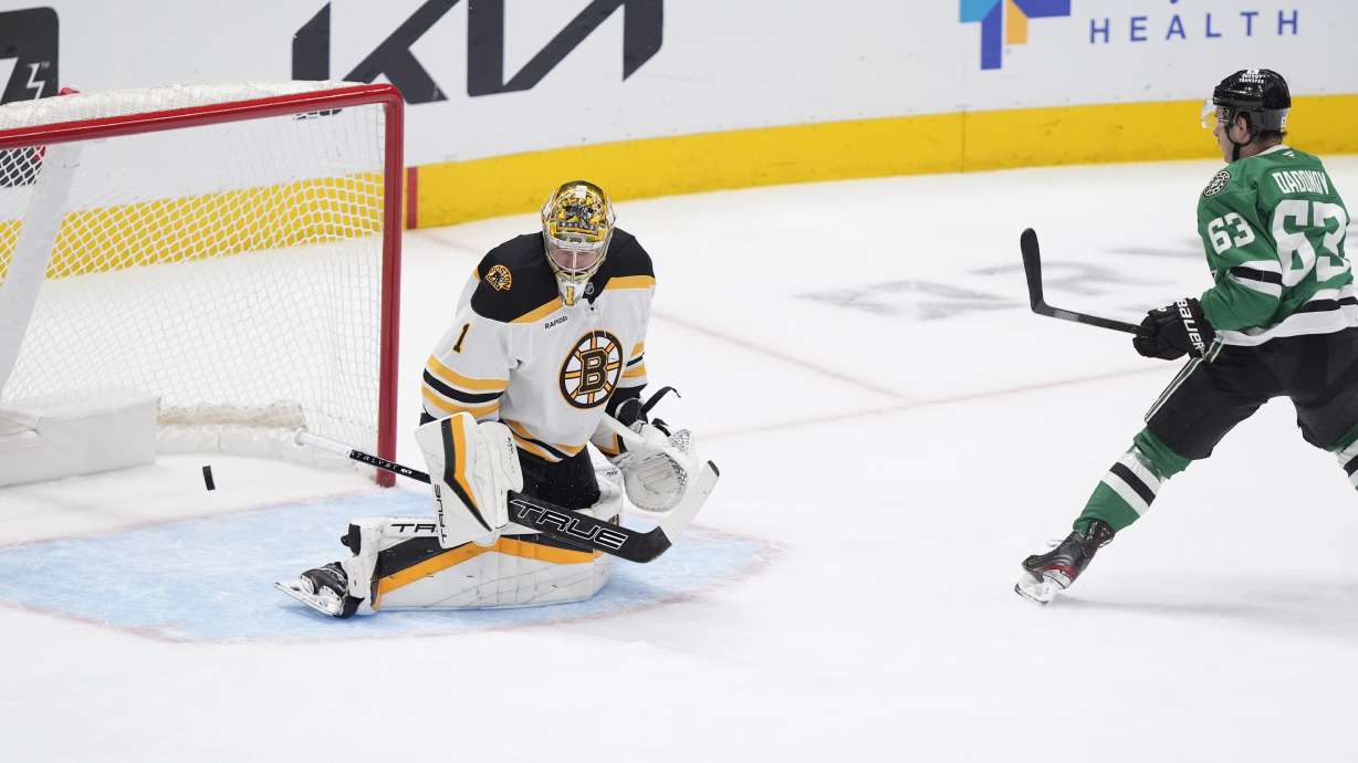 Dallas Stars right wing Evgenii Dadonov (63) scores a penalty shot goal against Boston Bruins goaltender Jeremy Swayman (1) during the first period of an an NHL hockey game Thursday, Nov. 14, 2024, in Dallas.