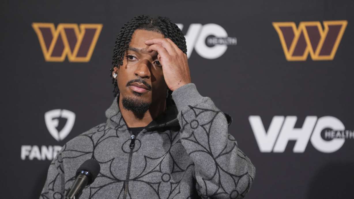 Washington Commanders quarterback Jayden Daniels pauses during a news conference following an NFL football game against the Philadelphia Eagles Thursday, Nov. 14, 2024, in Philadelphia.