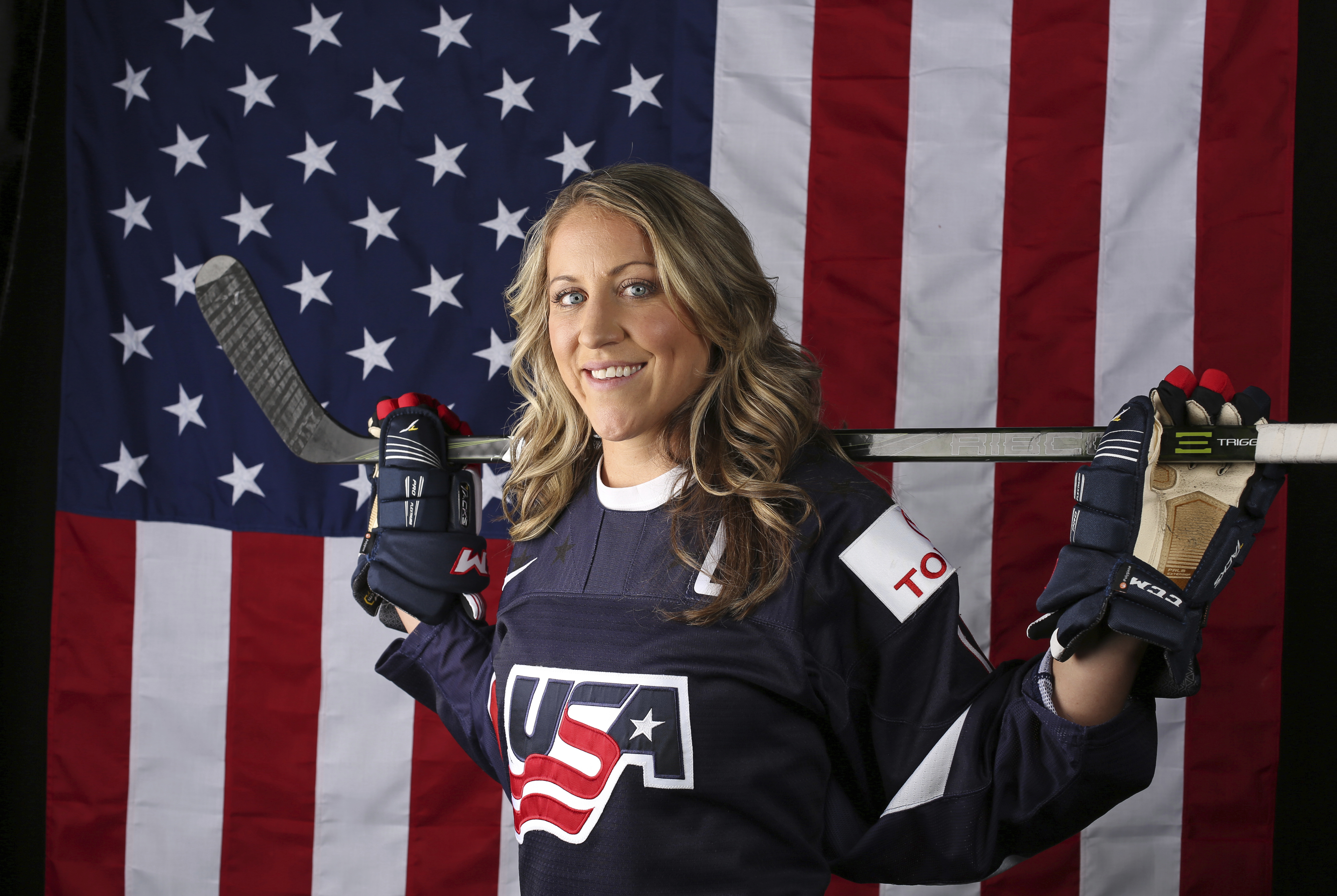 FILE - Meghan Duggan poses for a portrait at the 2017 Team USA Media Summit, Tuesday, Sept. 26, 2017, in Park City, Utah. 