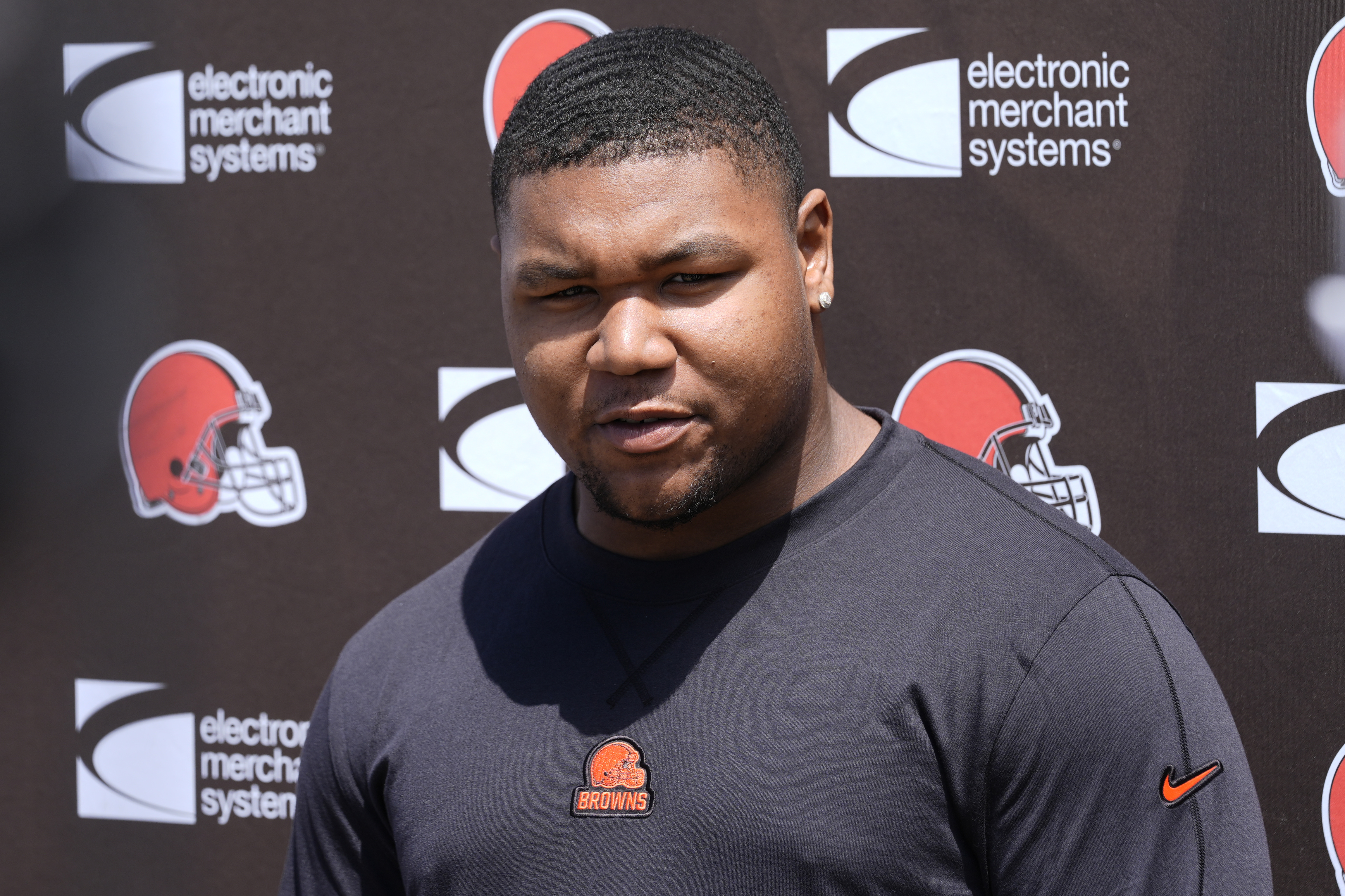 Mike Hall Jr., talks with reporters before a Cleveland Browns NFL football rookie minicamp, May 10, 2024, in Berea, Ohio.
