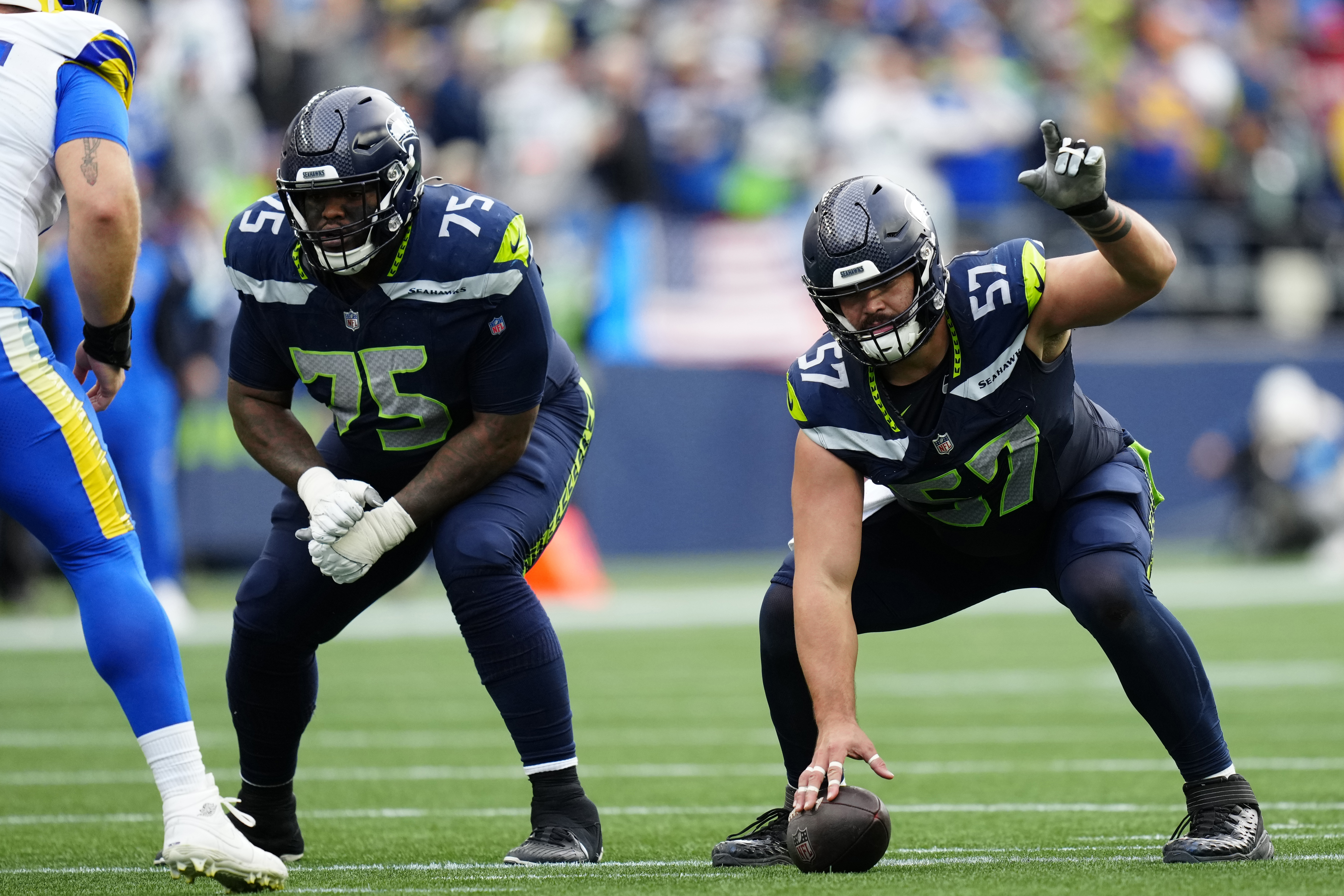 FILE - Seattle Seahawks center Connor Williams (57) points as he gets set during an NFL football game against the Los Angeles Rams, Nov. 3, 2024, in Seattle.