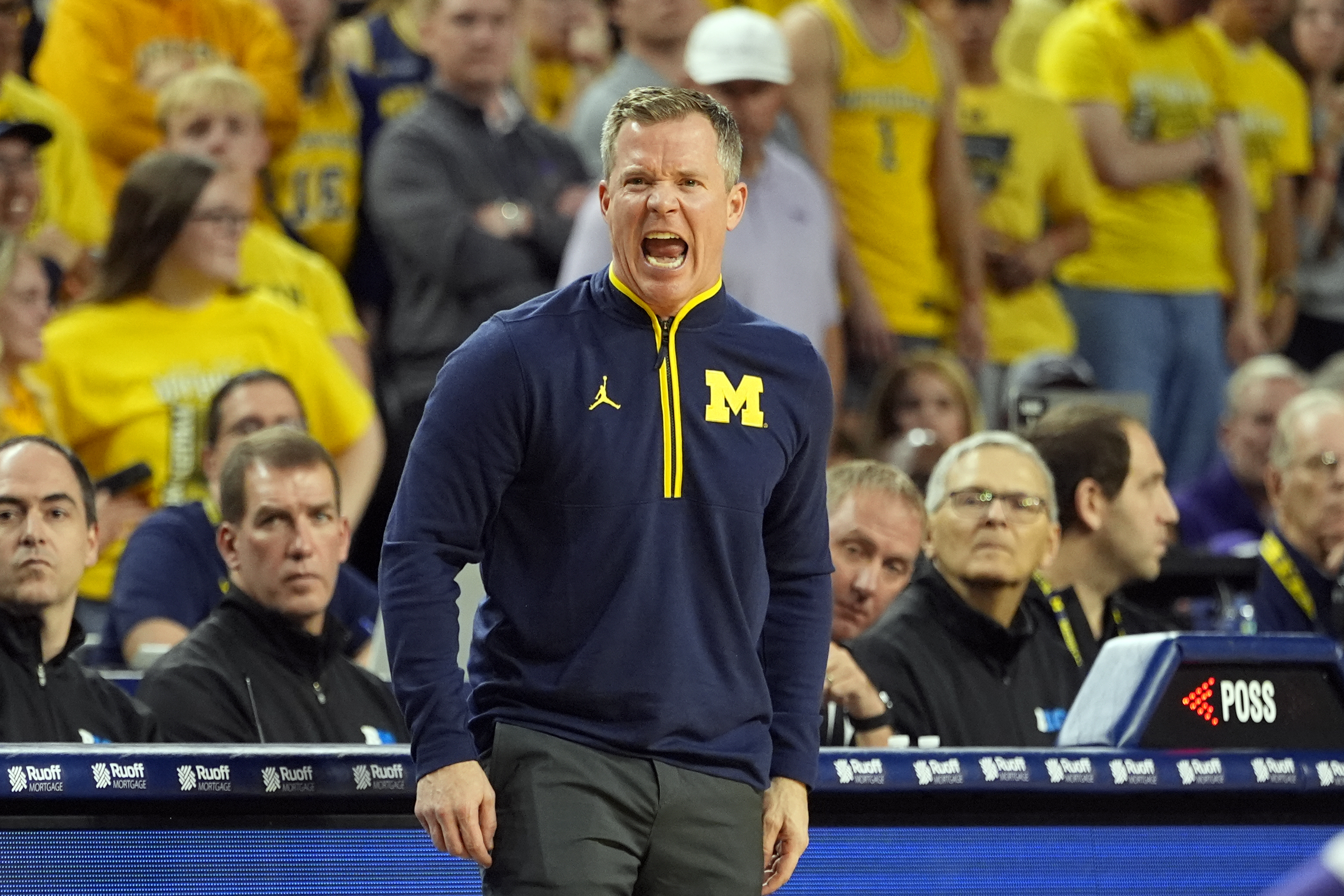Michigan head coach Dusty May yells during the first half of an NCAA college basketball game against TCU, Friday, Nov. 15, 2024, in Ann Arbor, Mich. 