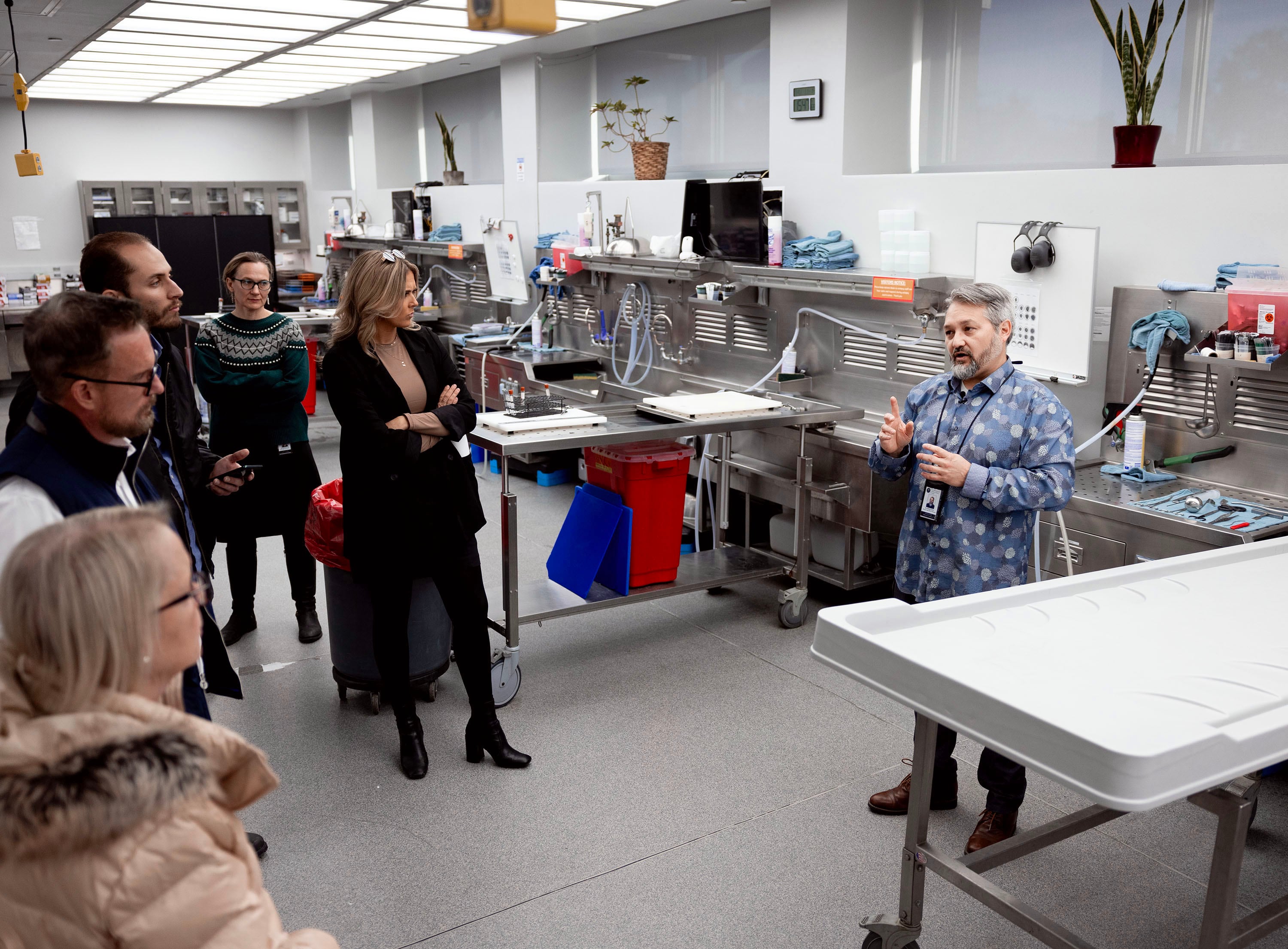 Morgue operations manager Brandon Callor speaks to the media at the Office of the Medical Examiner in Taylorsville, Utah, on Thursday.