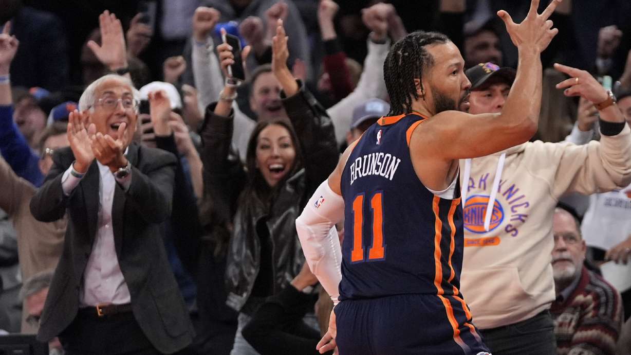 New York Knicks' Jalen Brunson reacts after scoring a three pointer in the last seconds of the second half of an Emirates NBA Cup basketball game against the Brooklyn Nets, Friday, Nov. 15, 2024, in New York.