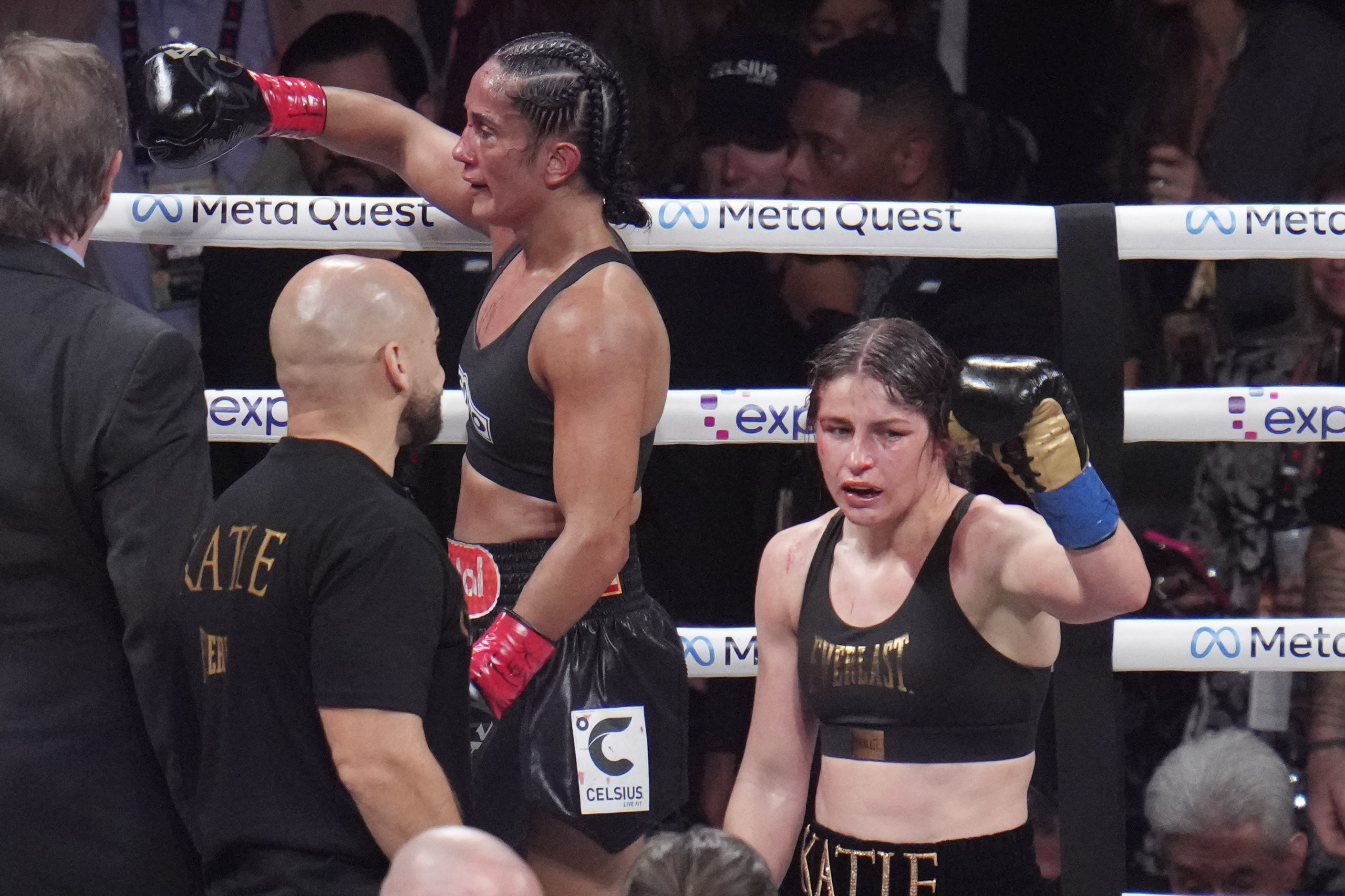 Amanda Serrano, left, and Katie Taylor react after their undisputed super lightweight title bout, Friday, Nov. 15, 2024, in Arlington, Texas.