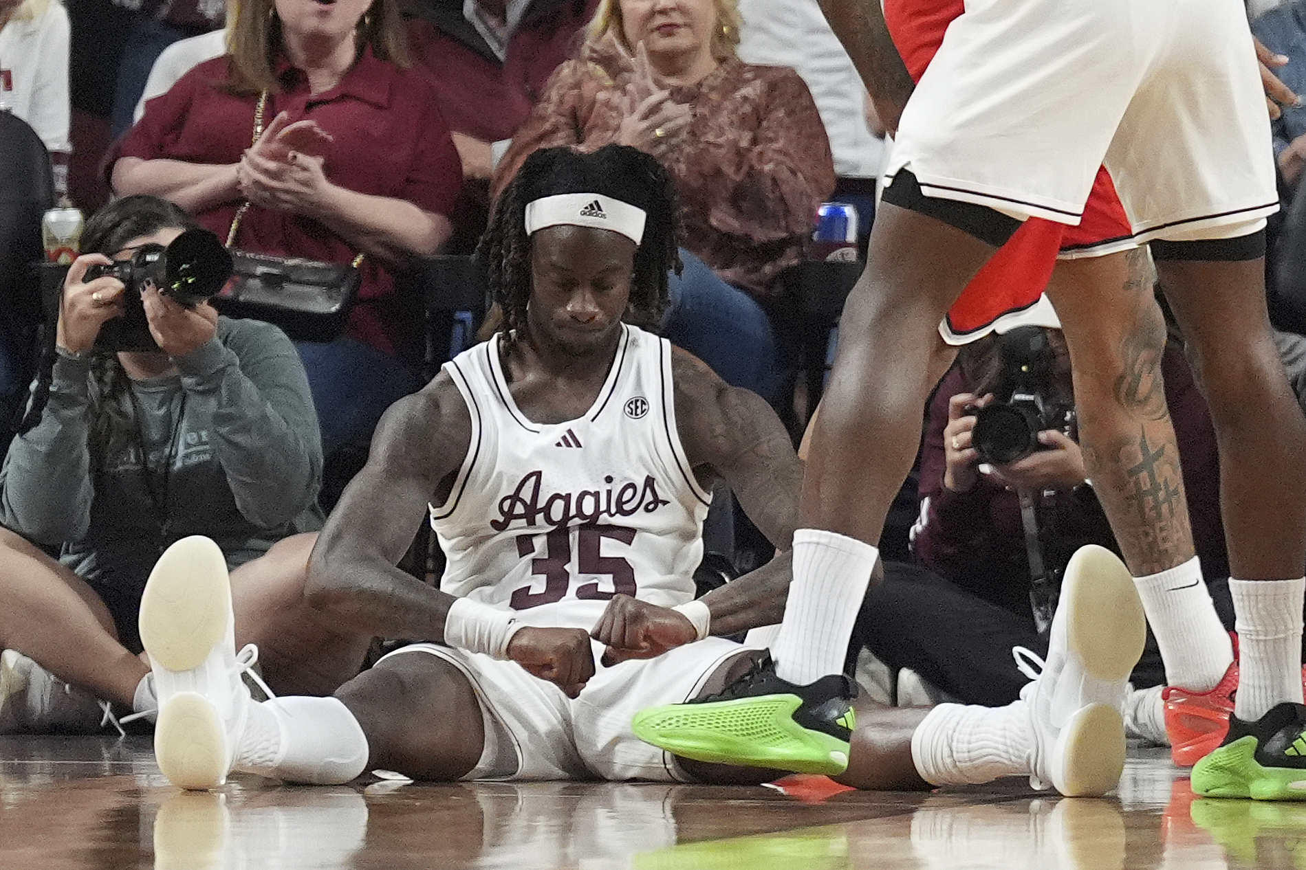 Texas A&M guard Manny Obaseki (35) reacts after being fouled on an and one shot against Ohio State during the second half of an NCAA college basketball game Friday, Nov. 15, 2024, in College Station, Texas.