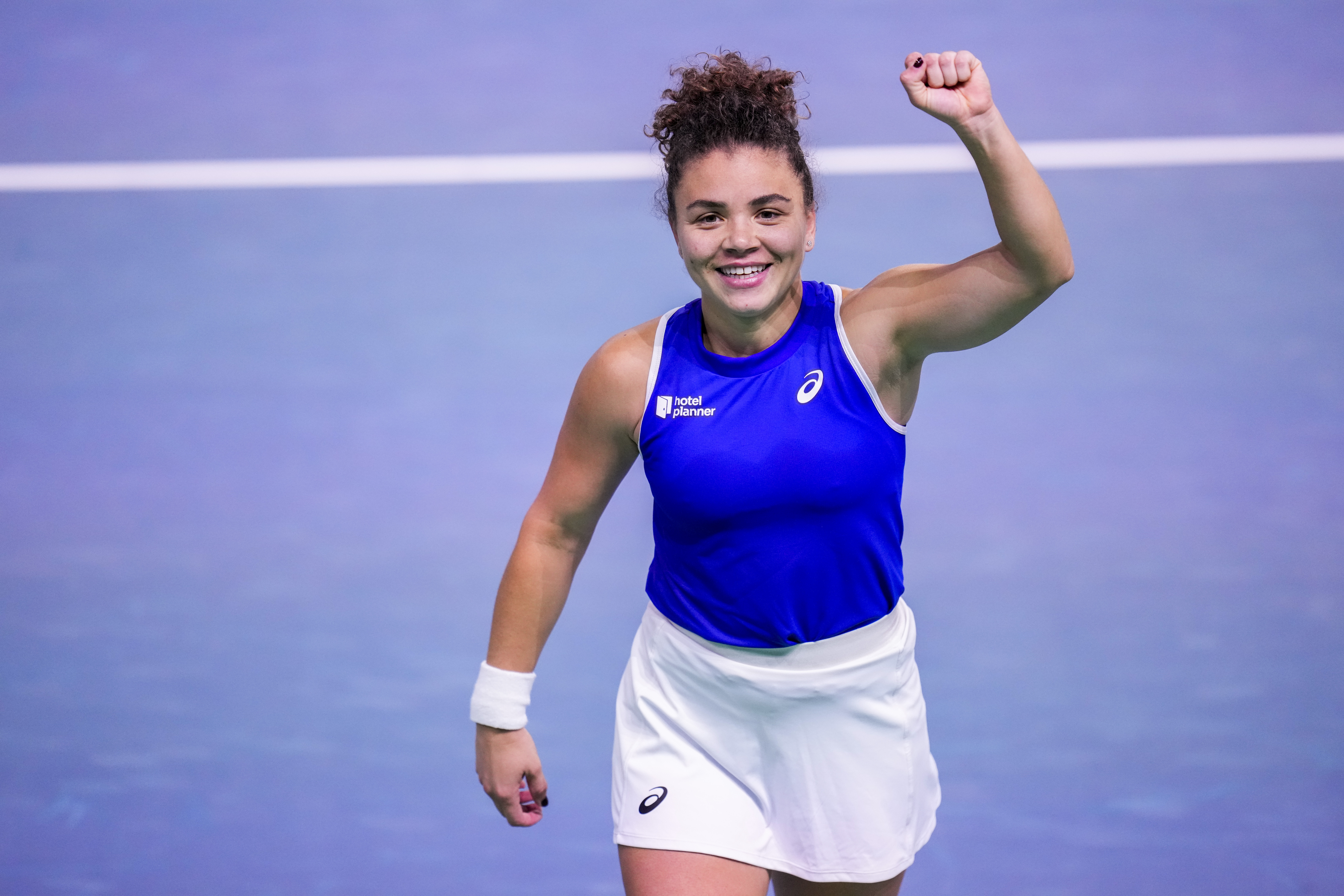Italy's Jasmine Paolini celebrates after winning against Japan's Moyuka Uchijima during the Billie Jean King Cup Finals, at the Martin Carpena Sports Hall, in Malaga, southern Spain, on Saturday, Nov. 16, 2024.