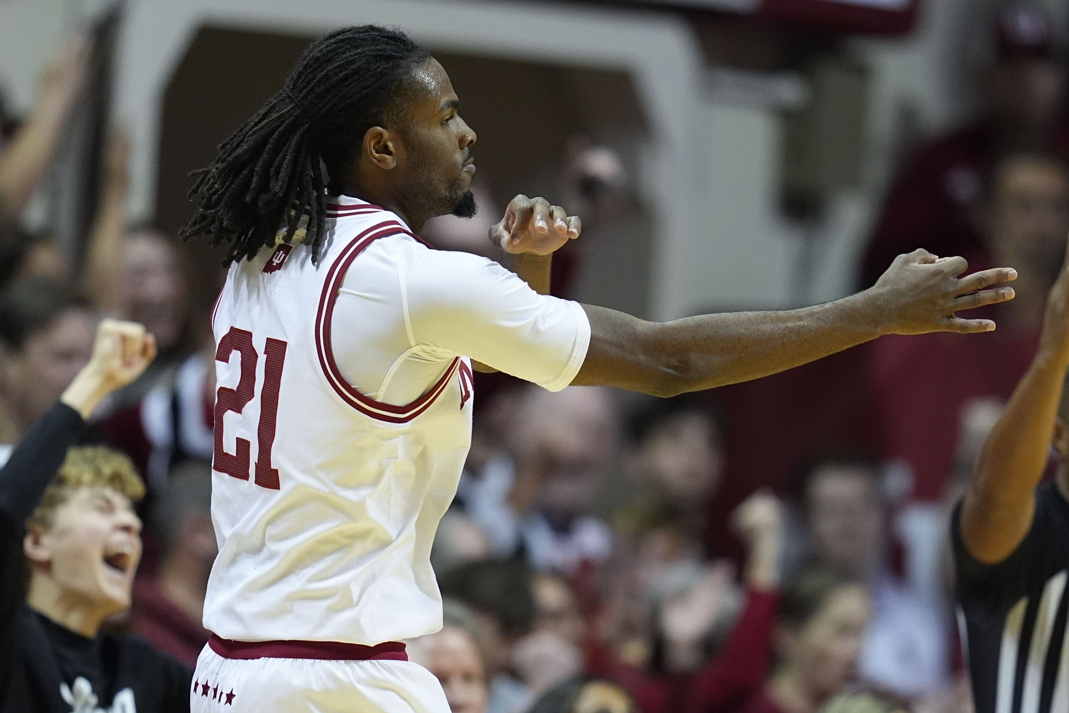 Indiana's Mackenzie Mgbako reacts after hitting a 3-point shot during the first half of an NCAA college basketball game against South Carolina, Saturday, Nov. 16, 2024, in Bloomington, Ind. 