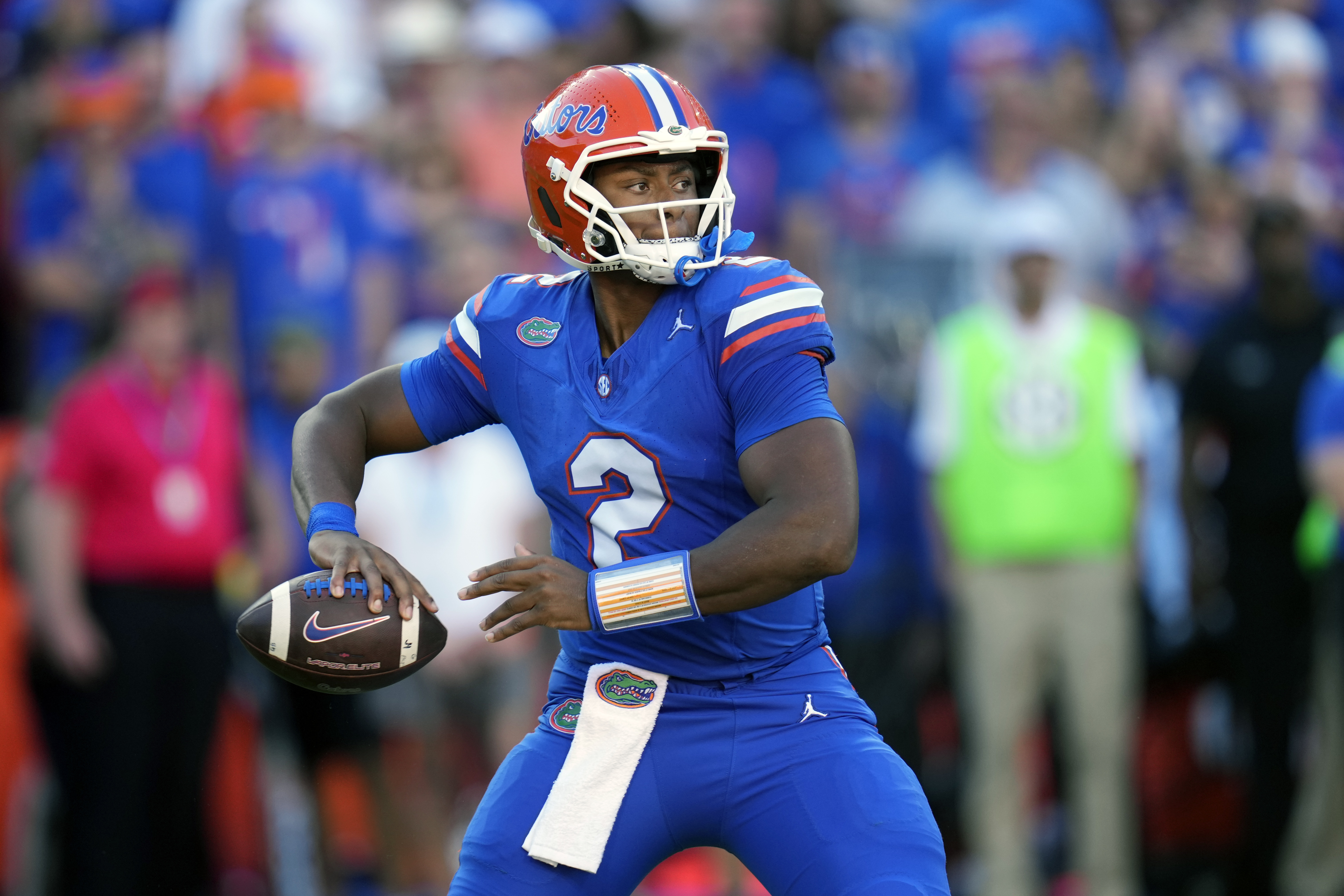 Florida quarterback DJ Lagway looks for a receiver during the first half of an NCAA college football game against LSU, Saturday, Nov. 16, 2024, in Gainesville, Fla.