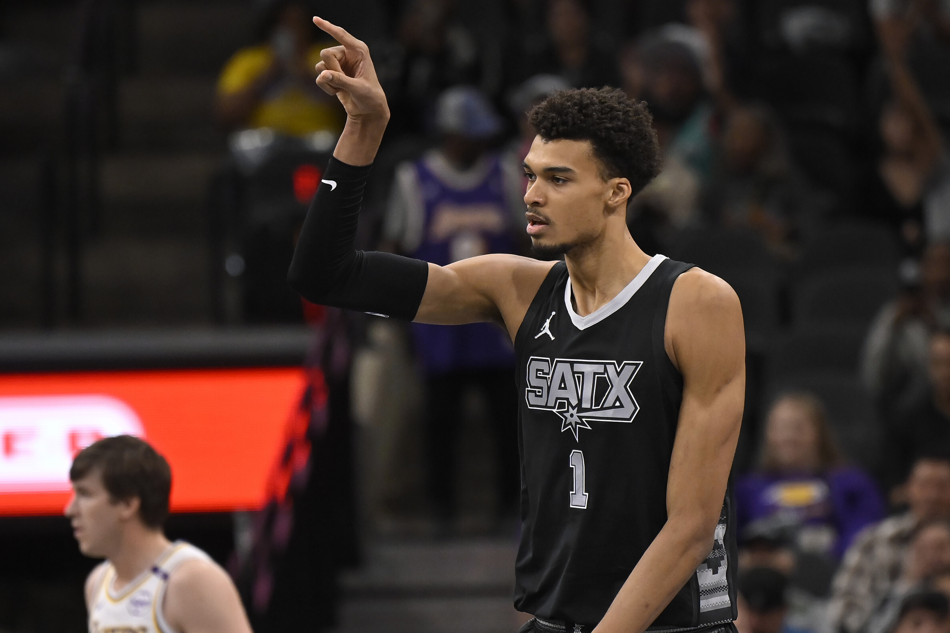 San Antonio Spurs' Victor Wembanyama celebrates a basket during the first half of an Emirates NBA Cup basketball game against the Los Angeles Lakers, Friday, Nov. 15, 2024, in San Antonio. 