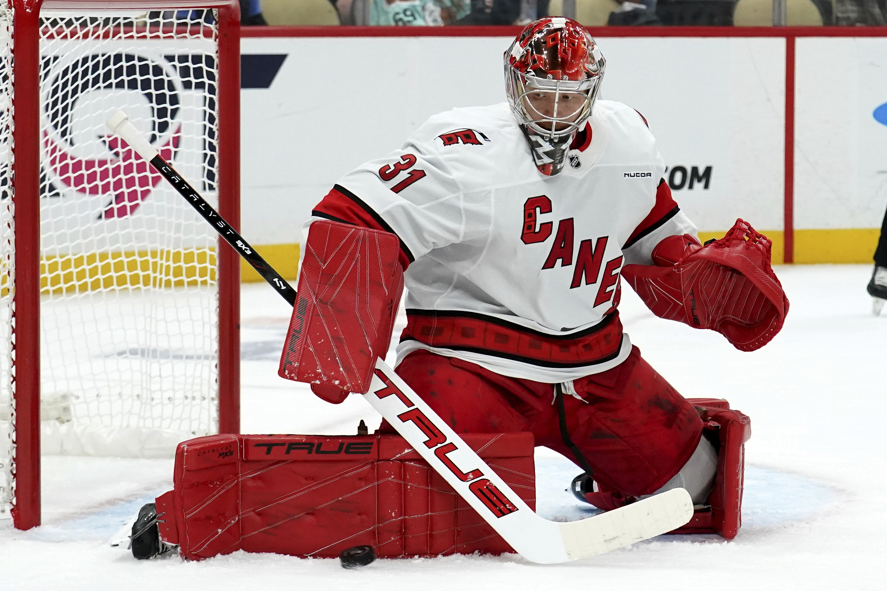 Carolina Hurricanes goaltender Frederik Andersen (31) makes a save during the second period of an NHL hockey game against the Pittsburgh Penguins, Friday, Oct. 18, 2024, in Pittsburgh. 