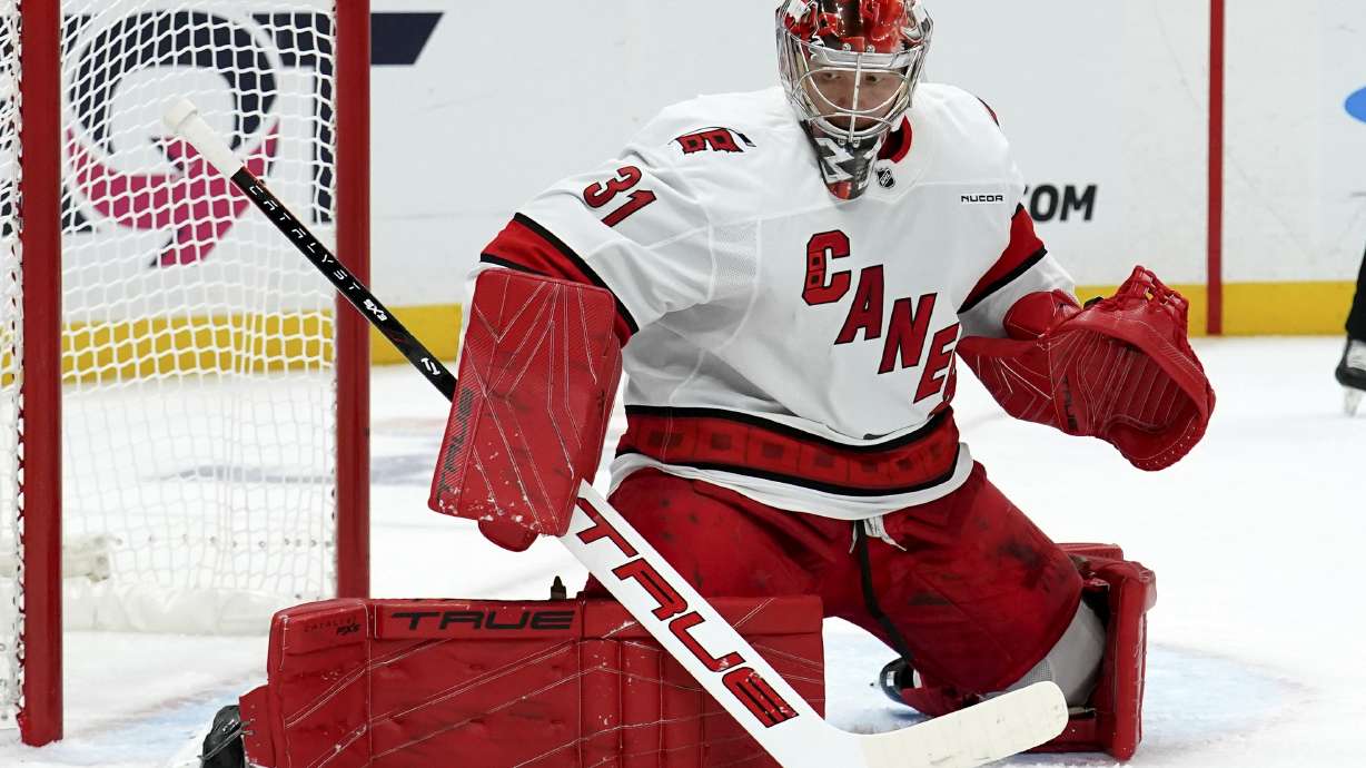 Carolina Hurricanes goaltender Frederik Andersen (31) makes a save during the second period of an NHL hockey game against the Pittsburgh Penguins, Friday, Oct. 18, 2024, in Pittsburgh.