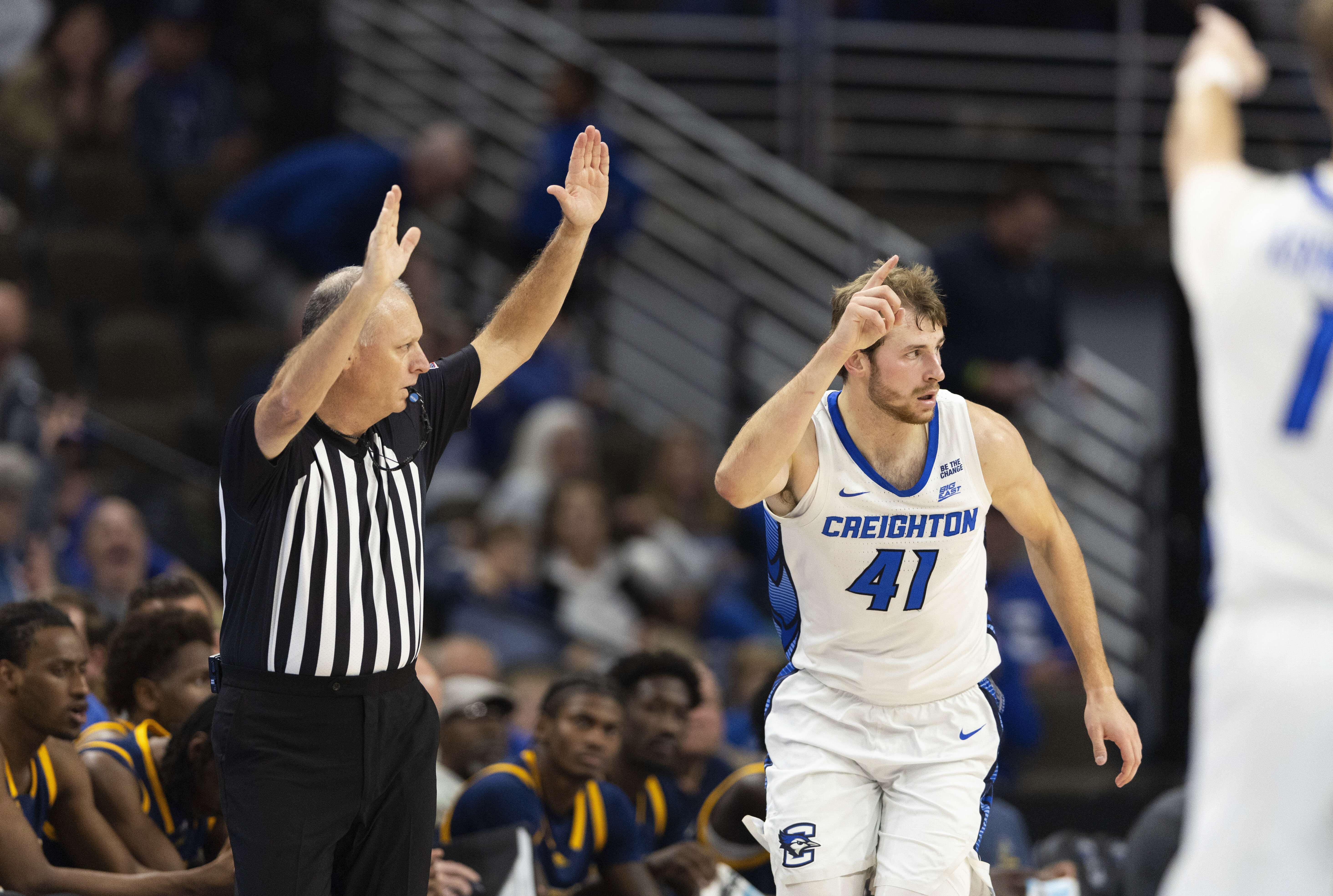 Creighton's Isaac Traudt (41) celebrates after making a 3-point basket against Kansas City during the first half of an NCAA college basketball game Saturday, Nov. 16, 2024, in Omaha, Neb.