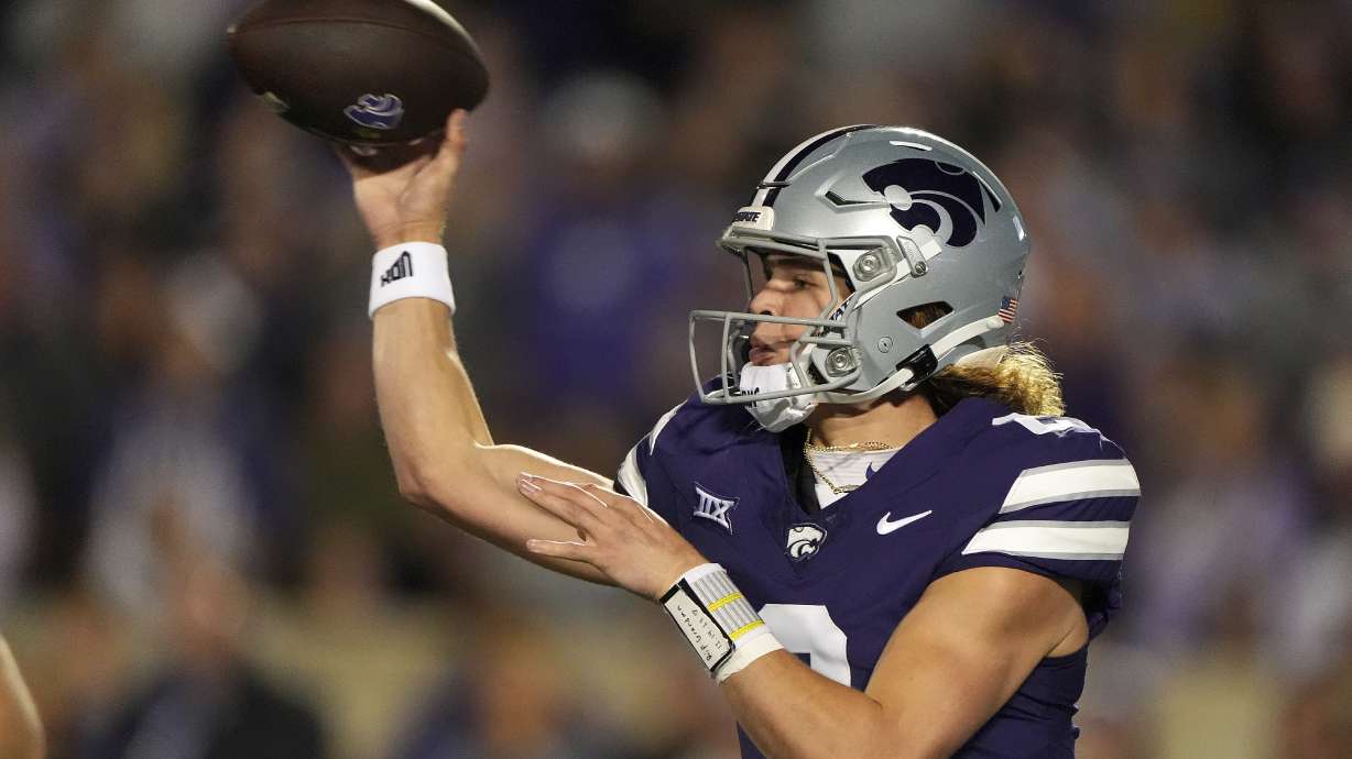 Kansas State quarterback Avery Johnson passes during the first half of an NCAA college football game against Arizona State Saturday, Nov. 16, 2024, in Manhattan, Kan.