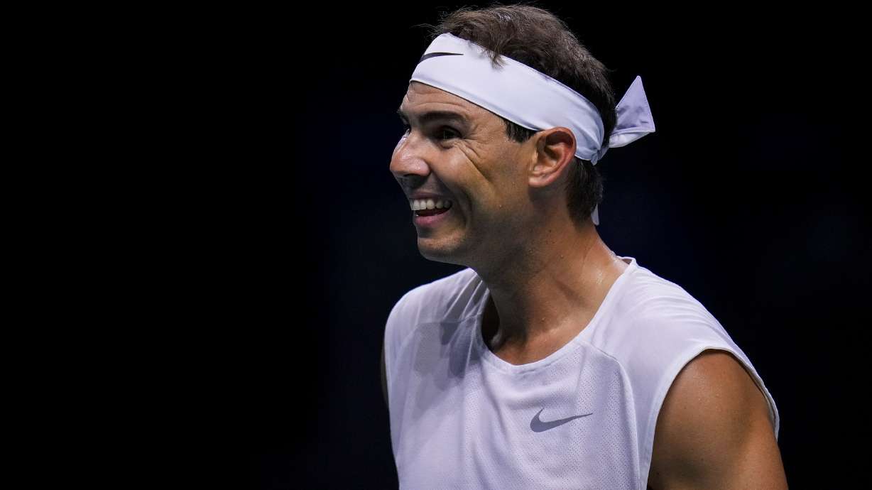 Spain's tennis player Rafael Nadal smiles during a training session at the Martin Carpena Sports Hall, in Malaga, southern Spain, on Saturday, Nov. 16, 2024.