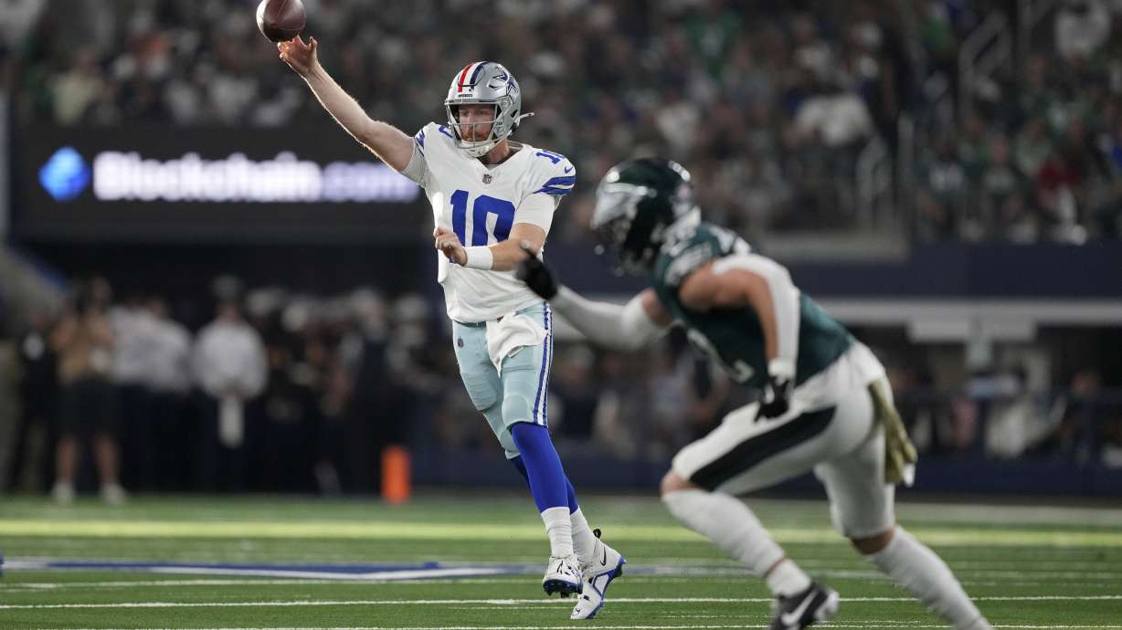 Dallas Cowboys quarterback Cooper Rush (10) throws a pass in the first half of an NFL football game against the Philadelphia Eagles in Arlington, Texas, Sunday, Nov. 10, 2024.