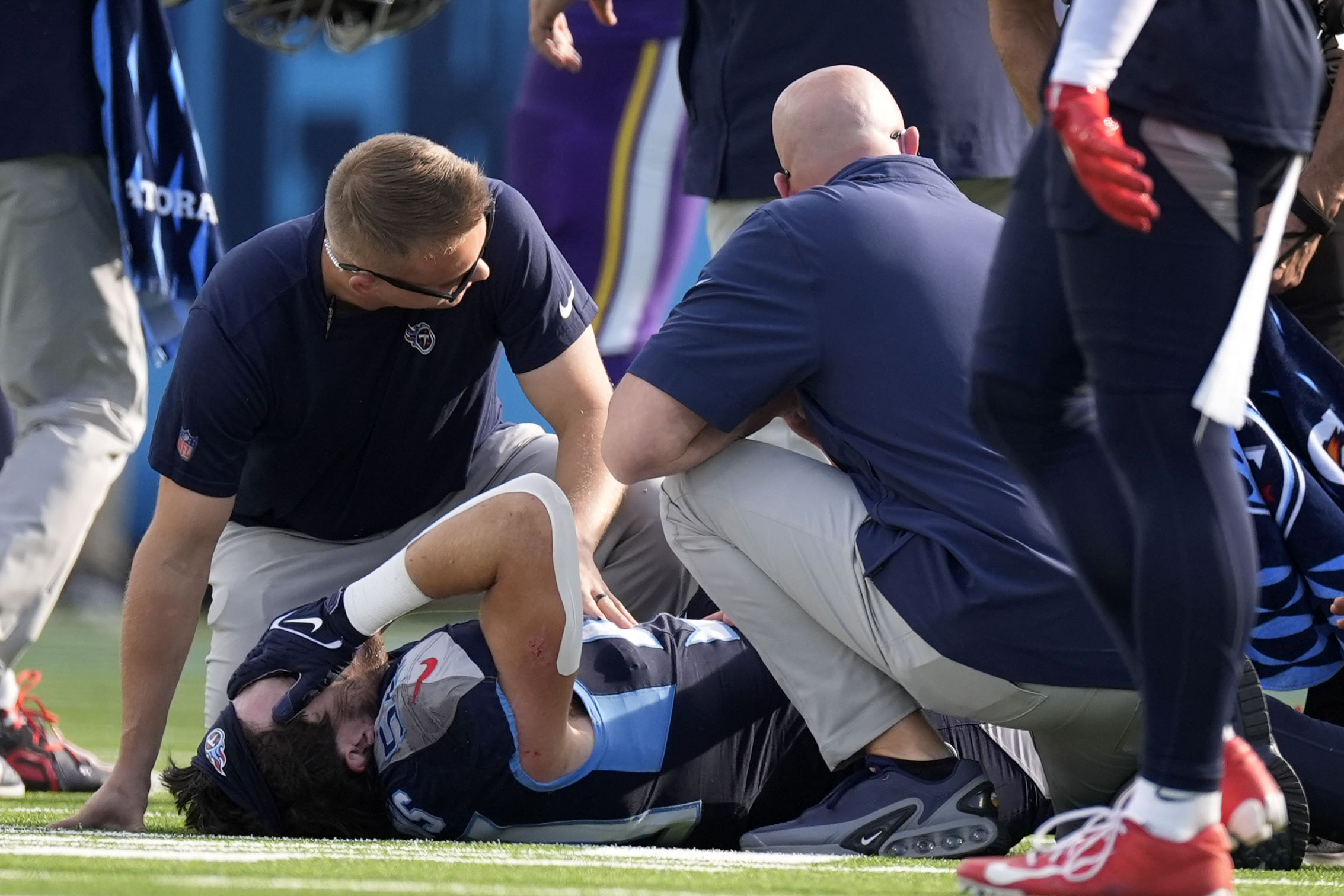 Tennessee Titans linebacker Jack Gibbens (50) lies on the field after getting injured during the second half of an NFL football game against the Minnesota Vikings, Sunday, Nov. 17, 2024, in Nashville, Tenn. 