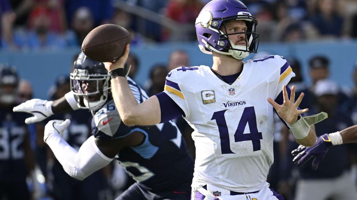 Minnesota Vikings quarterback Sam Darnold (14) throws a pass during the second half of an NFL football game against the Tennessee Titans, Sunday, Nov. 17, 2024, in Nashville, Tenn.