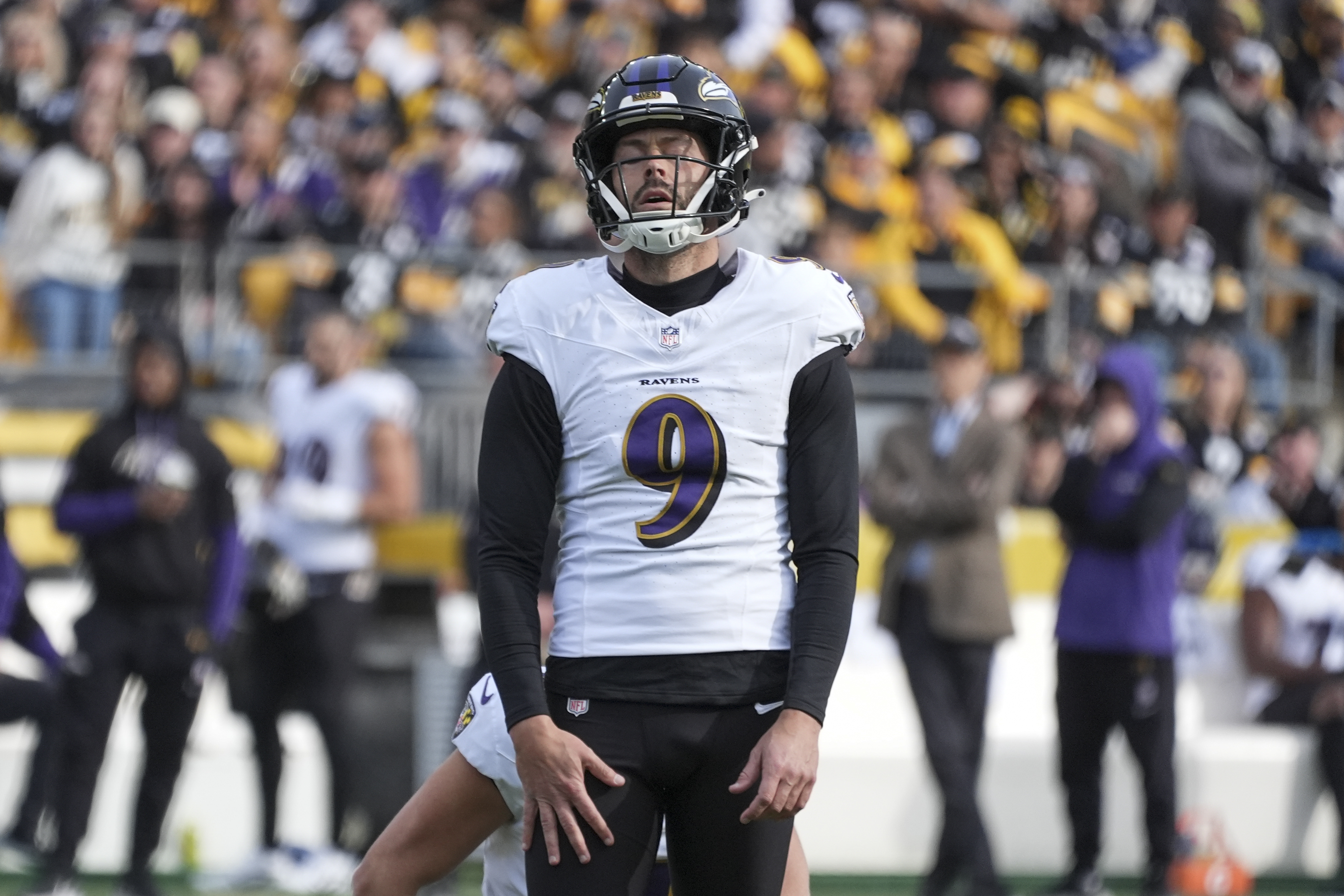Baltimore Ravens place kicker Justin Tucker reacts after missing a field goal against the Pittsburgh Steelers during the first half of an NFL football game, Sunday, Nov. 17, 2024, in Pittsburgh. 