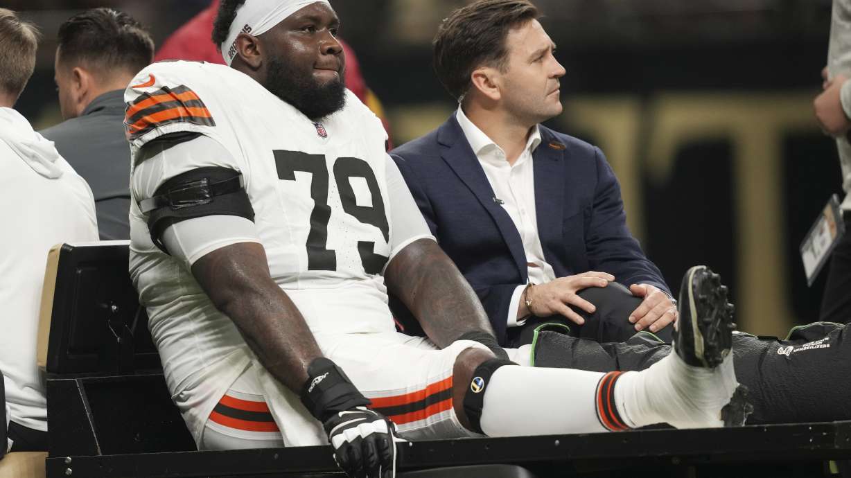 Cleveland Browns offensive tackle Dawand Jones (79) is carted off the field after an injury in the first half of an NFL football game against the New Orleans Saints in New Orleans, Sunday, Nov. 17, 2024.