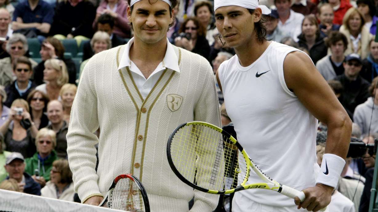 FILE - Switzerland's Roger Federer left, and Spain's Rafael Nadal pose for a photo prior to the start of the men's singles final on the Centre Court at Wimbledon, July 6, 2008