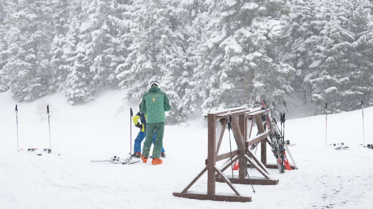 Skiers prepare to leave the St. Regis Deer Valley at Deer Valley Resort in Park City on March 23, 2023. The resort added over 300 acres of terrain in the offseason, with many more on the way.