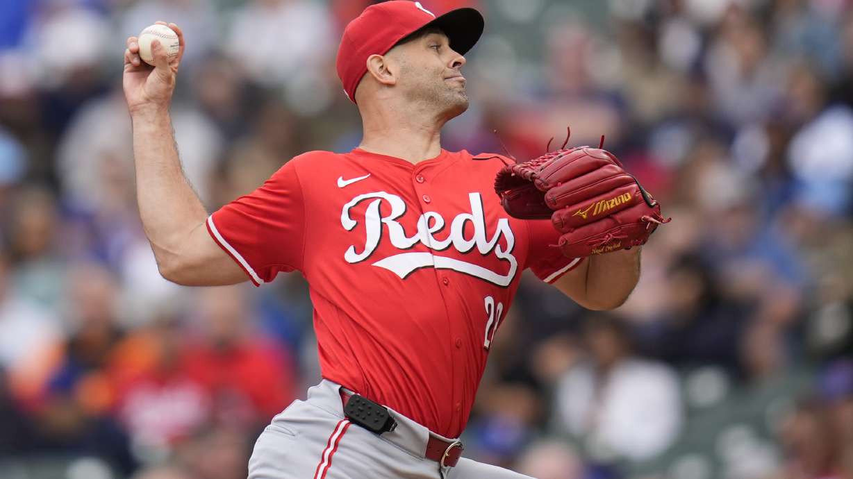 FILE - Cincinnati Reds starting pitcher Nick Martinez throws against the Chicago Cubs during the first inning of a baseball game Friday, Sept. 27, 2024, in Chicago.
