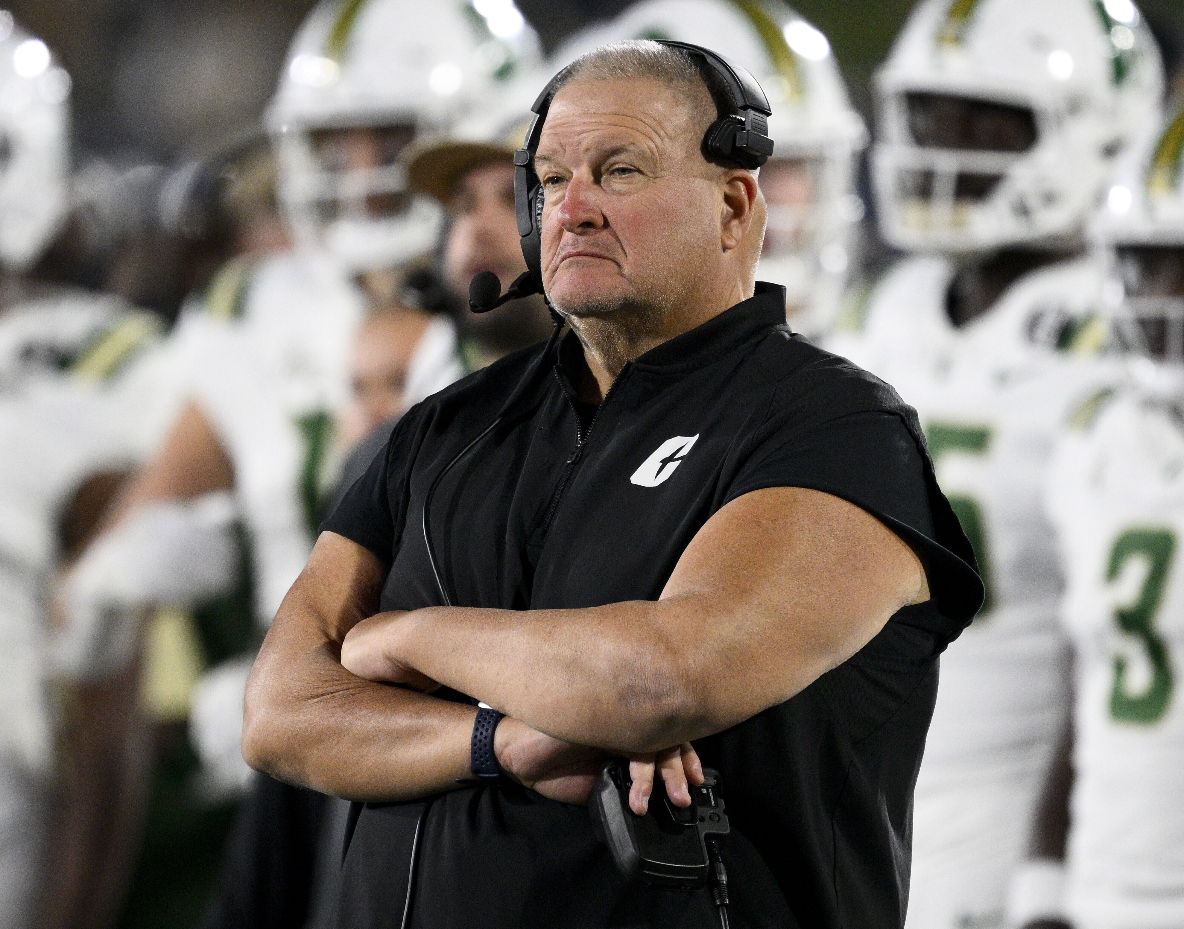 FILE - Charlotte head coach Biff Poggi watches the second half of an NCAA college football game against Navy, Oct. 19, 2024, in Annapolis, Md. 