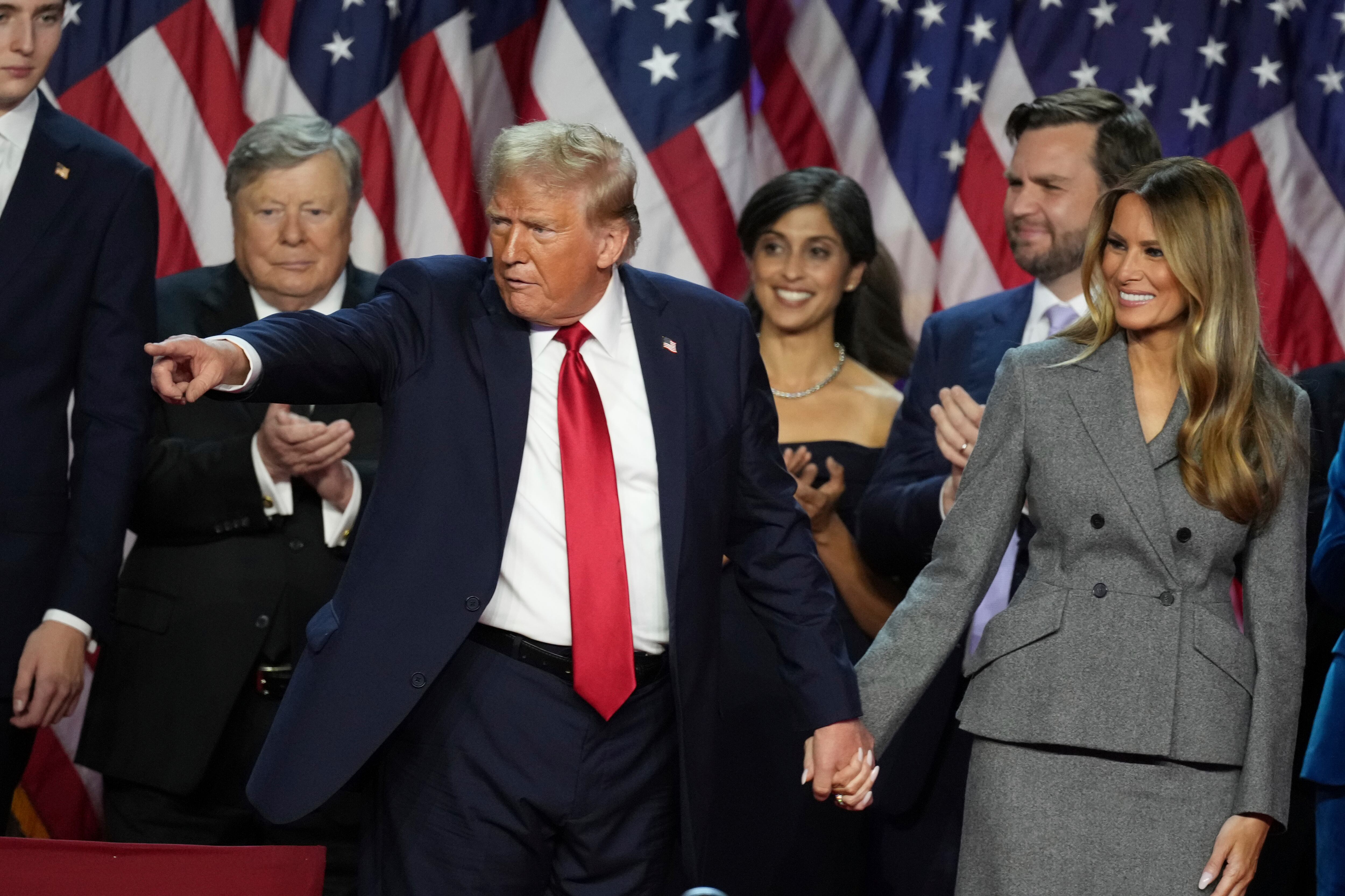 Republican Presidential nominee former President Donald Trump holds hands with former first lady Melania Trump during an election night watch party Nov. 6 in West Palm Beach, Fla. Trump won over a large number of members of The Church of Jesus Christ of Latter-day Saints who voted in the Nov. 5 election.