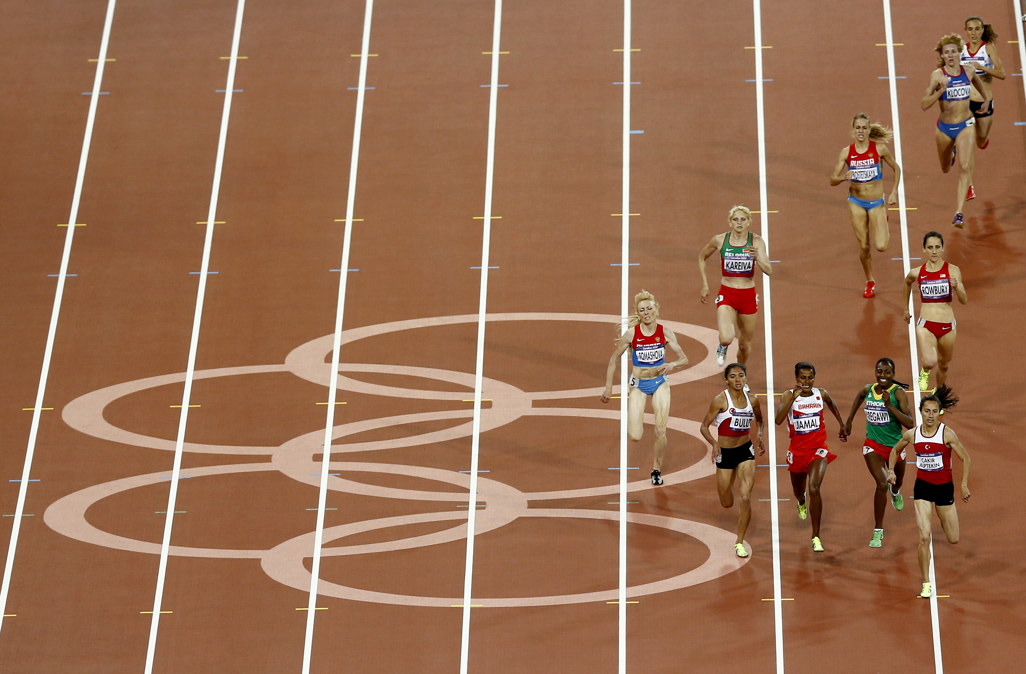 FILE - Shannon Rowbury of the United States, center right, sixth from the winner, competes in the women's 1500-meter field during the athletics in the Olympic Stadium at the 2012 Summer Olympics, London, Friday, Aug. 10, 2012.