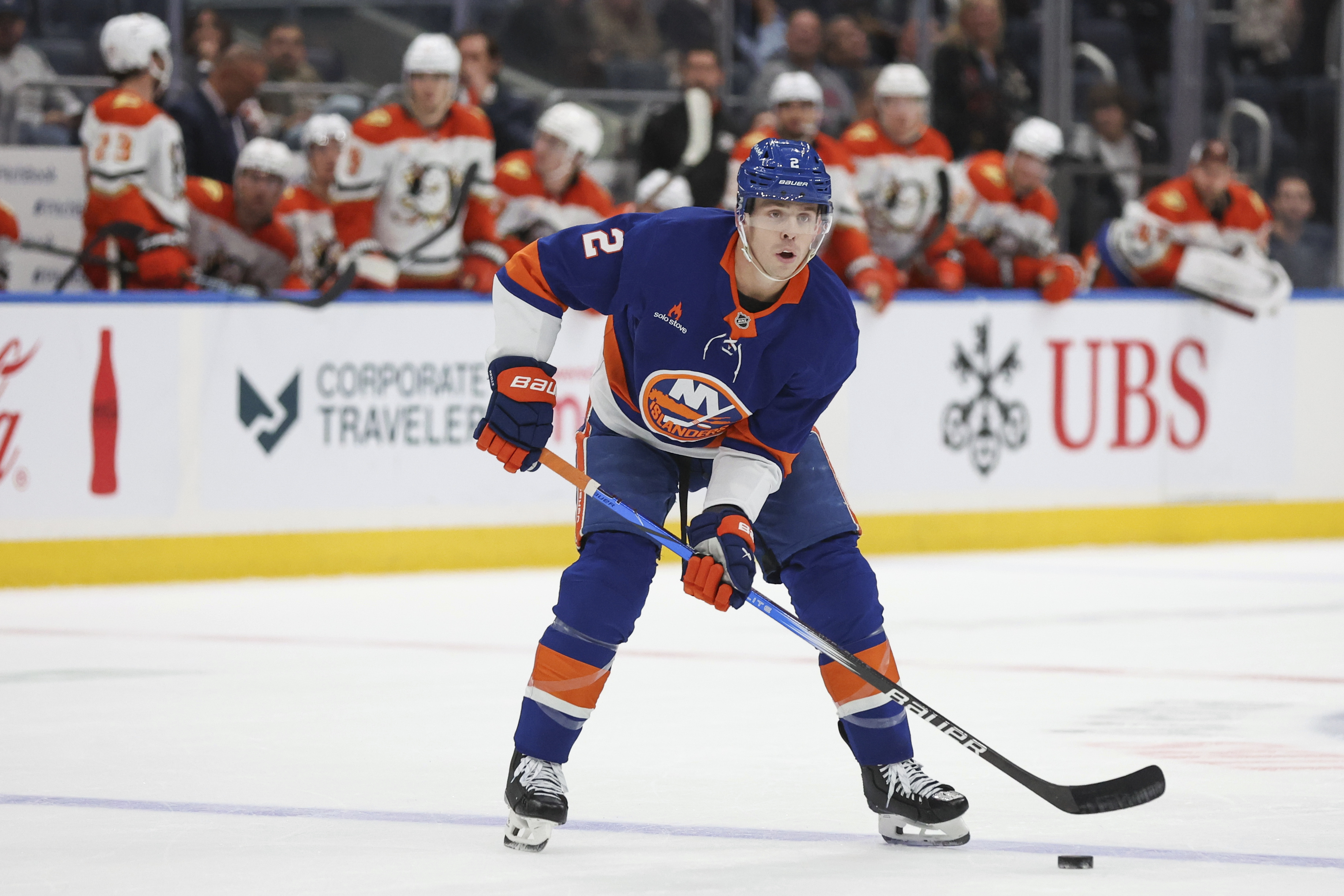 New York Islanders' Mike Reilly controls the puck during the second period of an NHL hockey game against the Anaheim Ducks, Tuesday, Oct. 29, 2024 in Elmont, N.Y. 