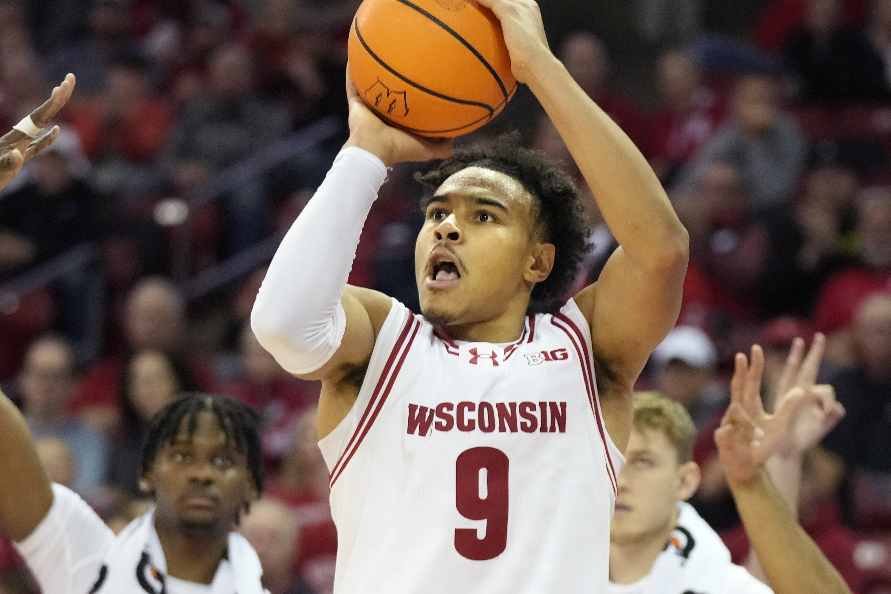 Wisconsin guard John Tonje (9) looks to shoot a 3-point basket against Texas Rio Grande Valley during the second half of an NCAA college basketball game Monday, Nov. 18, 2024, in Madison, Wis. 