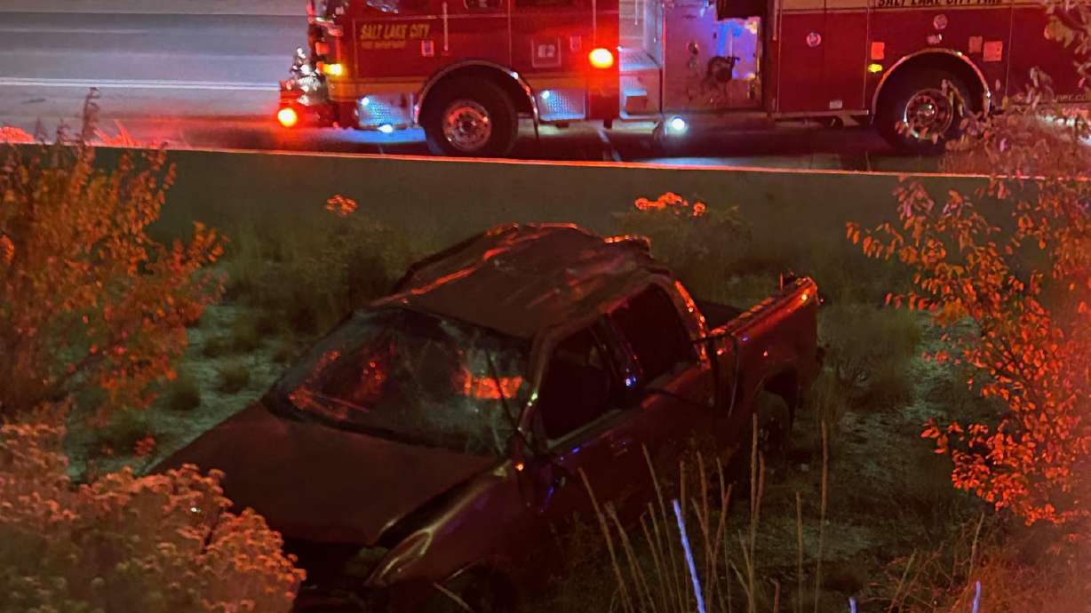 A truck rolled over into the media of I-15 near 600 South Tuesday morning, killing one person.