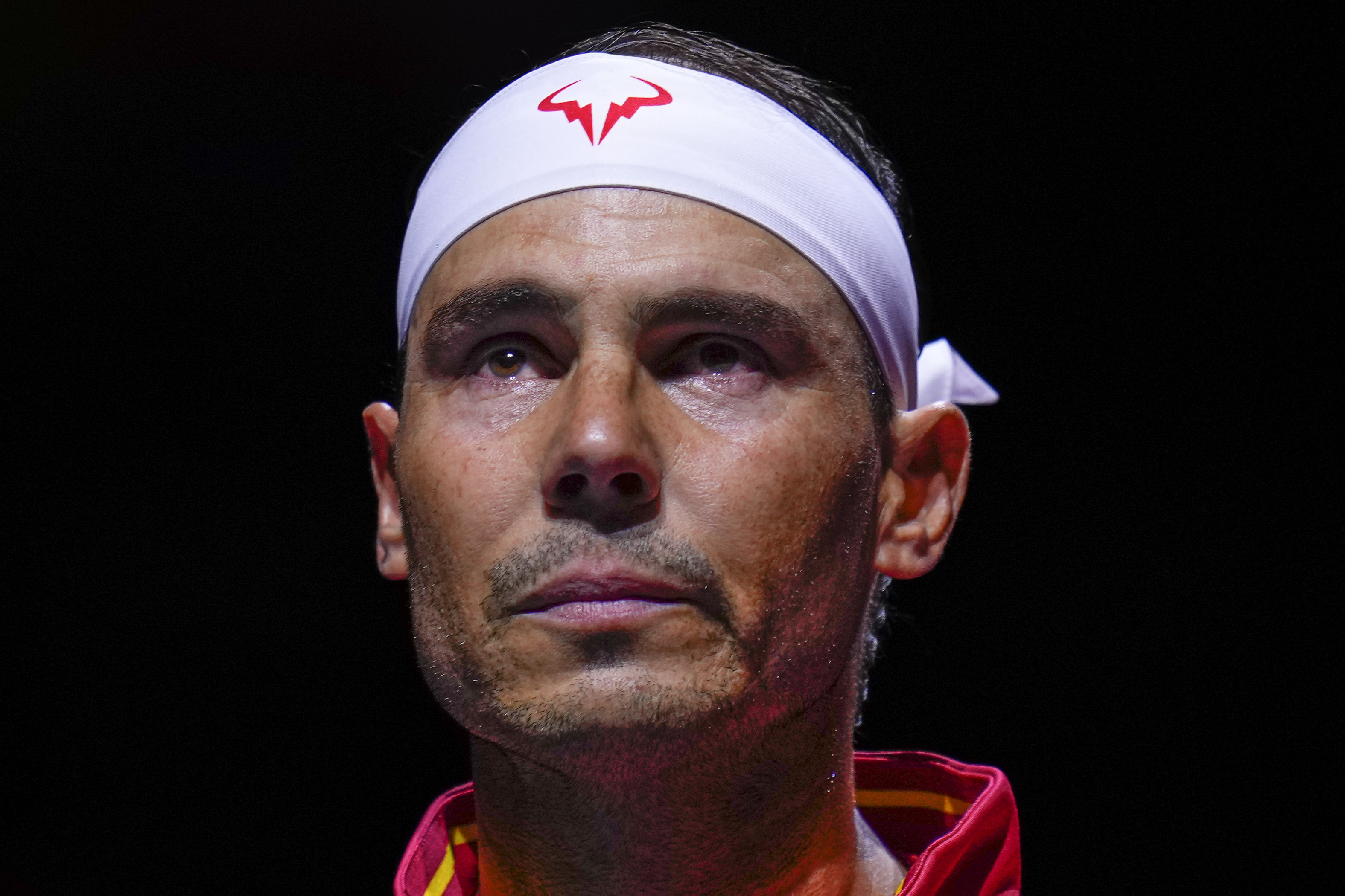 Spain's tennis player Rafael Nadal during the national anthem ahead of a Davis Cup quarterfinal match against Netherlands' Botic Van De Zandschulp at Martin Carpena Sports Hall in Malaga, southern Spain, on Tuesday, Nov. 19, 2024.