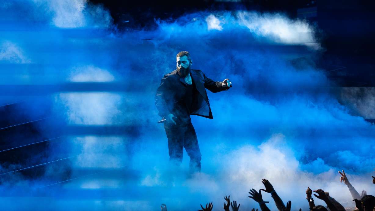 Post Malone performs during the NBA All-Star Game in Salt Lake City on Feb. 19, 2023. Malone on Tuesday announced his summer stadium tour, which kicks off at Rice-Eccles Stadium on April 29, 2025.