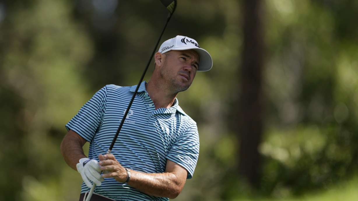 FILE - Brian Harman hits off the second tee during the third round of the BMW Championship golf event at Castle Pines Golf Club, Saturday, Aug. 24, 2024, in Castle Rock, Colo.