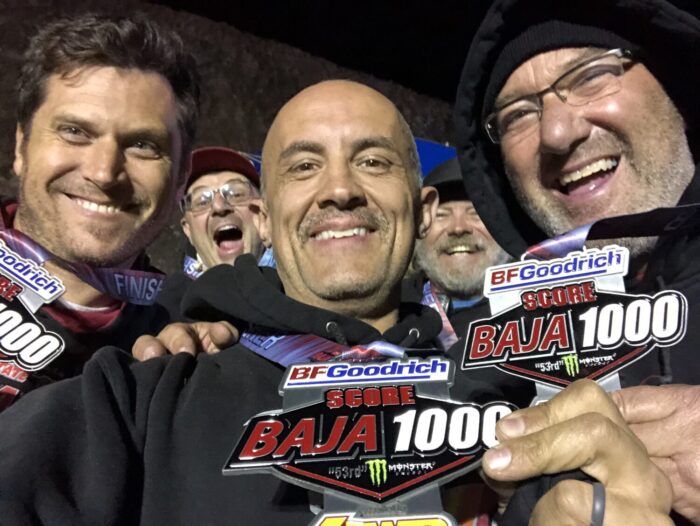 Darren Webster, center, was scheduled to compete in the Baja 1000 desert race with his team, Canguro Racing, but instead landed in the hospital on Nov. 14.