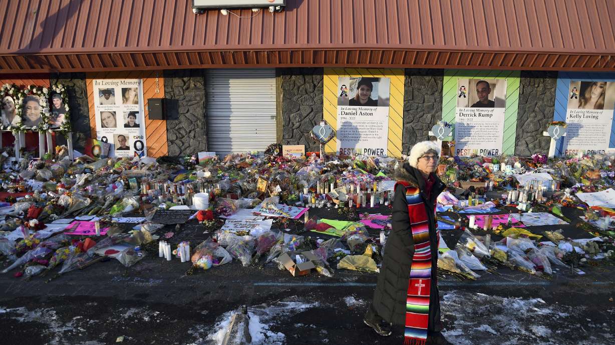 The Rev. Paula Stecker of the Christ the King Lutheran Church at a memorial outside Club Q after a mass shooting at the gay nightclub in Colorado Springs, Colo., Nov. 29, 2022. Victims' families have filed lawsuits over the deaths at the club.