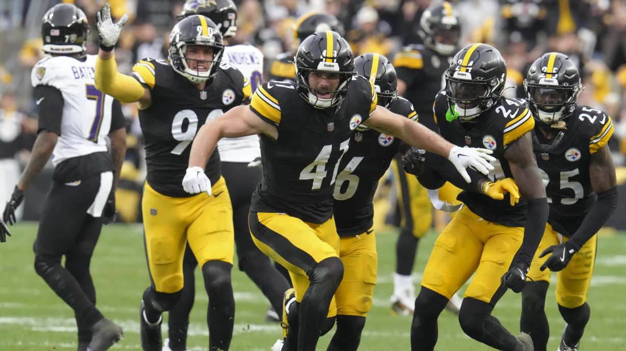 Pittsburgh Steelers linebacker Payton Wilson (41) reacts after intercepting a pass from the Baltimore Ravens during the second half of an NFL football game, Sunday, Nov. 17, 2024, in Pittsburgh.
