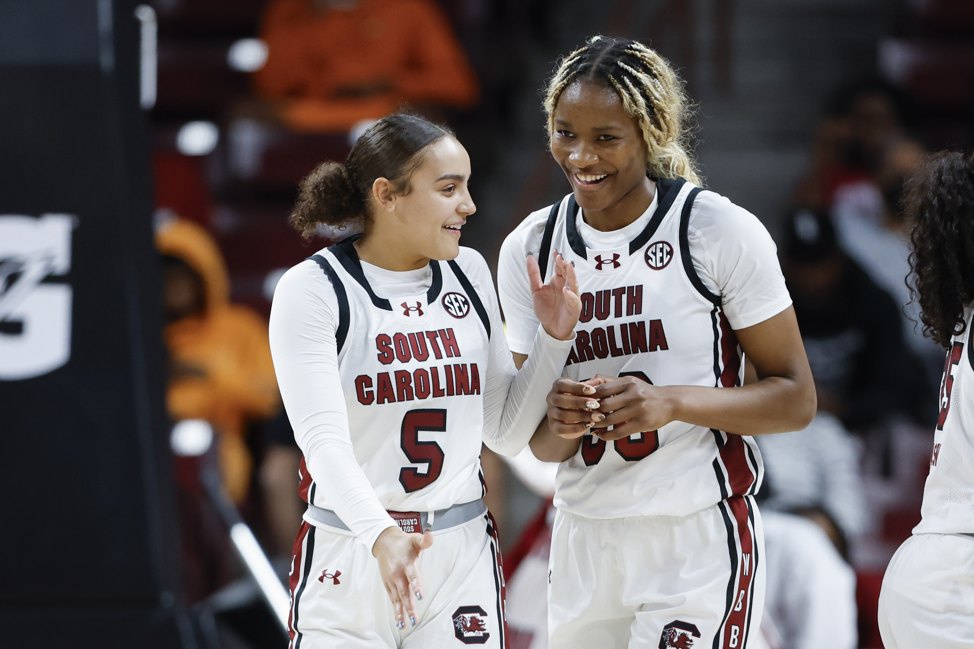 South Carolina guard Tessa Johnson (5) laughs with forward Maryam Dauda during a break in the action in the second half of an exhibition NCAA college basketball game against Clayton State in Columbia, S.C., Monday, Oct. 28, 2024.
