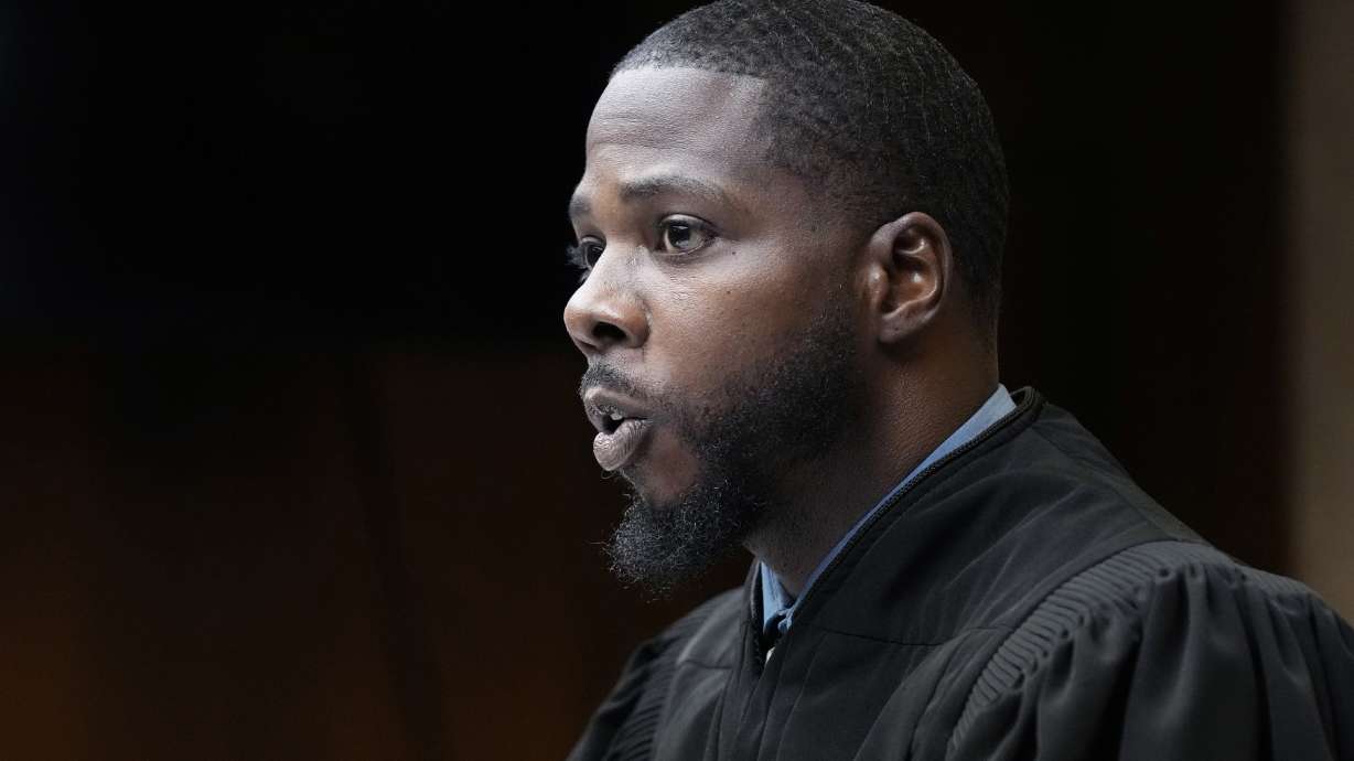 Judge Kwame Rowe presides over the sentencing hearing of Ethan Crumbley, Dec. 8, 2023, in Pontiac, Mich. Prosecutors are opposing a request that Rowe toss out the school shooter's guilty plea and life sentence.