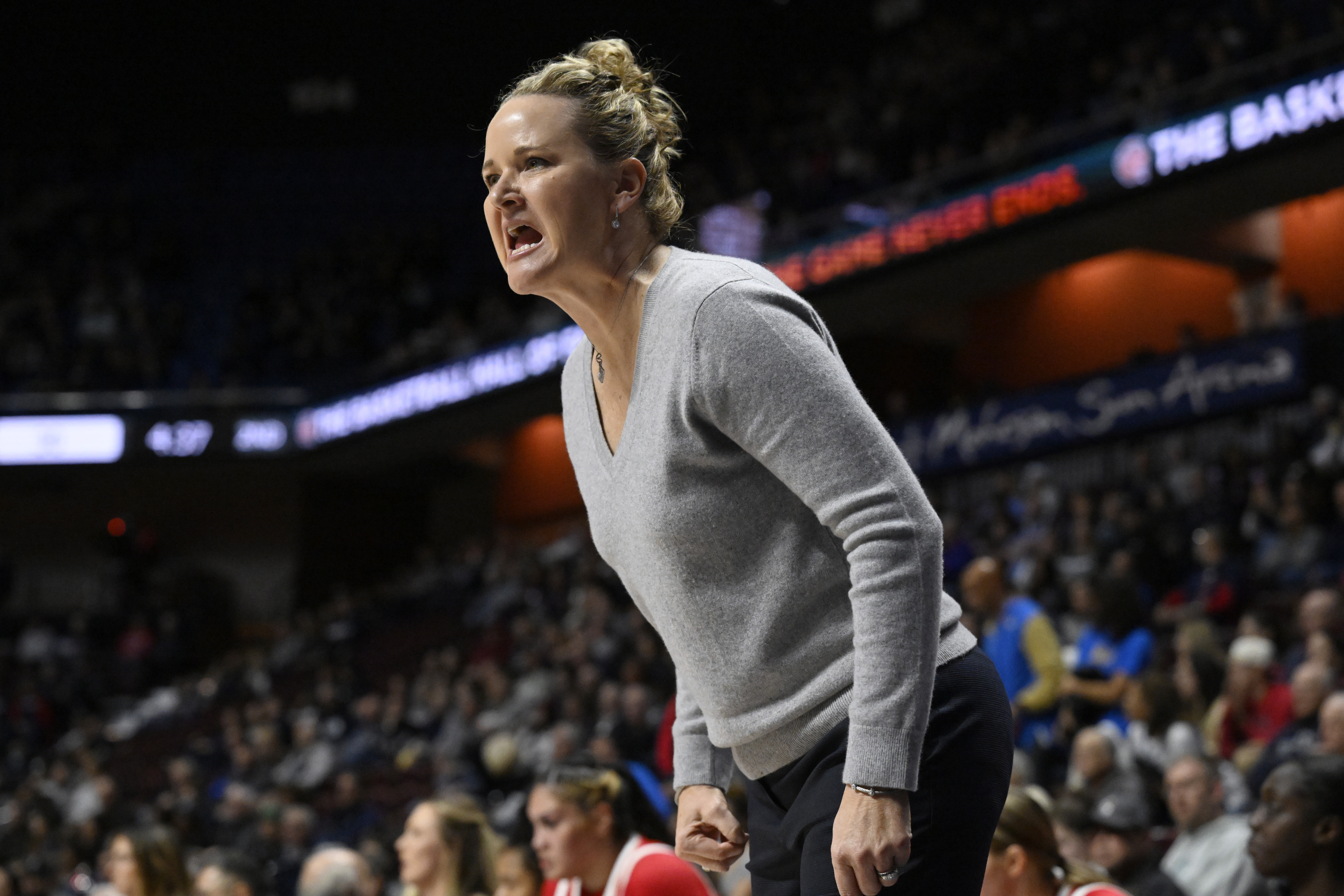 FILE - Utah head coach Lynne Roberts reacts in the first half of an NCAA college basketball game against South Carolina, Dec. 10, 2023, in Uncasville, Conn.
